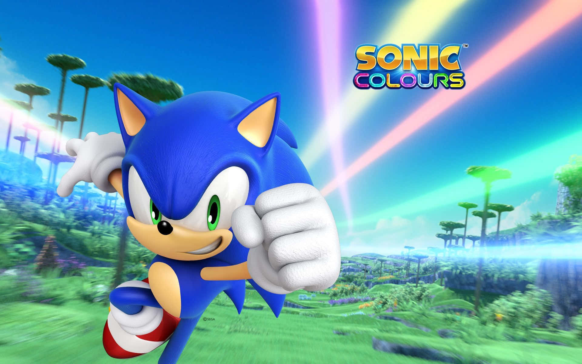Sonic Colors 桌布 壁紙 — Sonic the Hedgehog 在充滿活力的彩虹光照亮的外星風景中，帶著燦爛笑容向前衝刺。