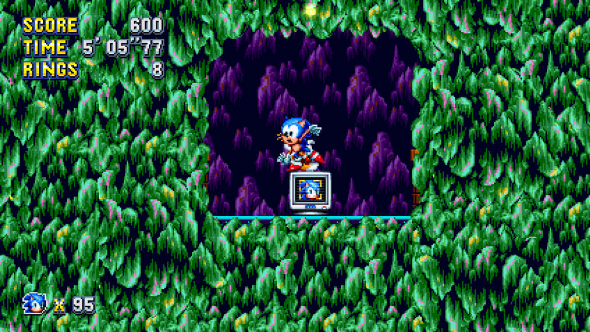  壁紙 — Sonic the Hedgehog 穿過像素化的綠色叢林隧道，帶有紫色岩石結構和遊戲HUD元素。