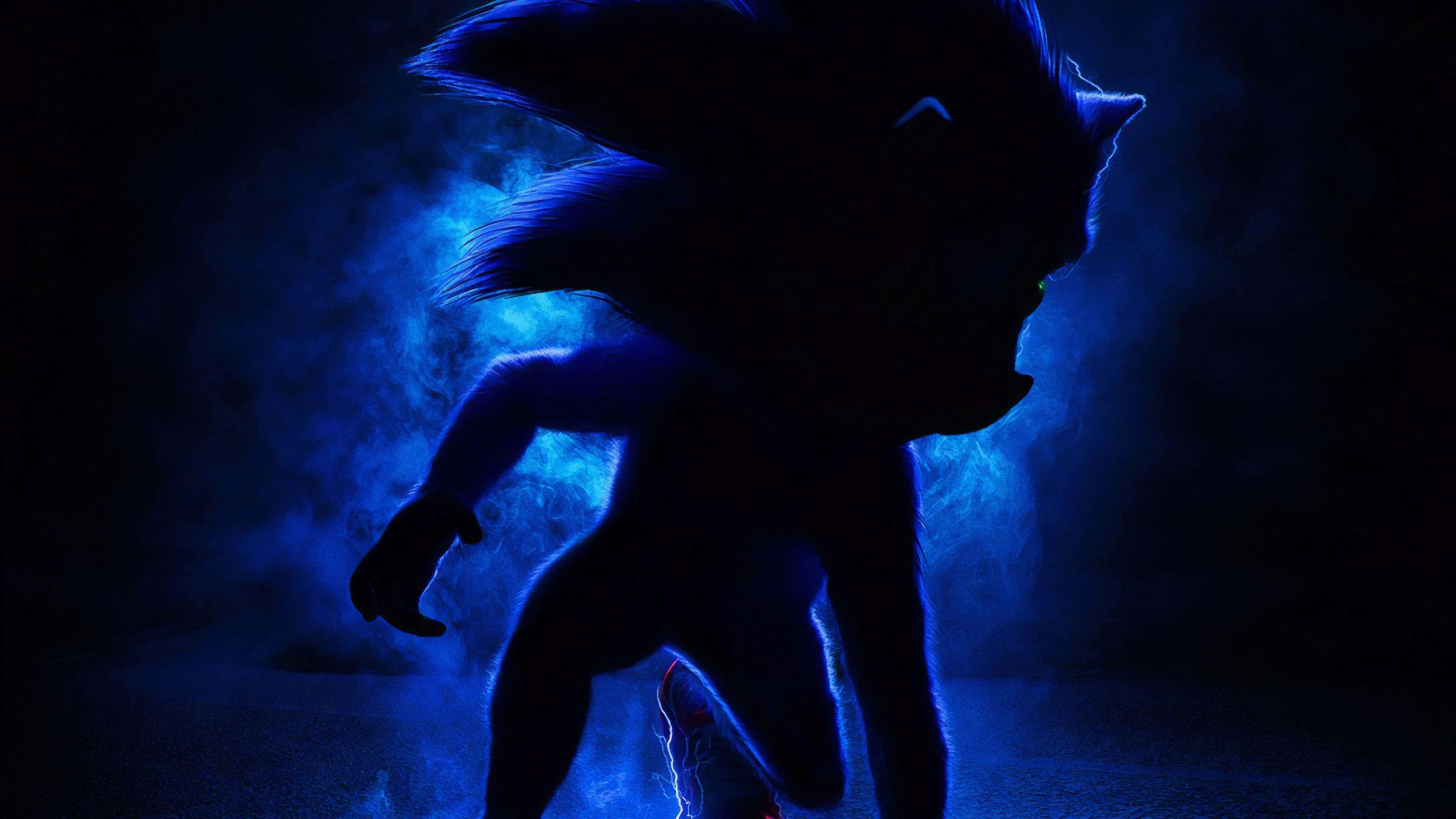 桌布 壁紙 — Sonic the Hedgehog 在黑暗煙霧背景中以電光藍色能量呈現剪影。