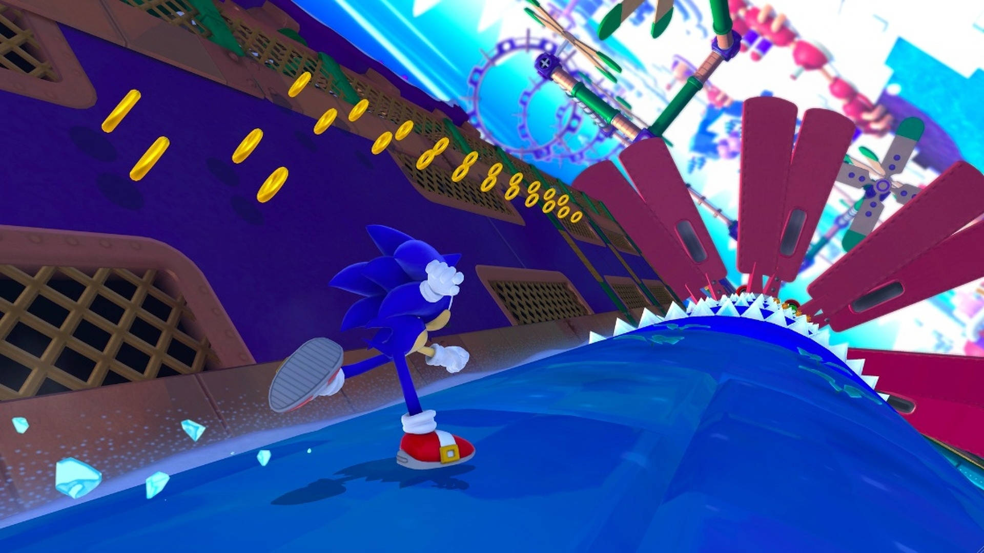 World 桌布 壁紙 — Sonic the Hedgehog 在充滿活力的未來城市景觀中飛馳，收集金色環圈。