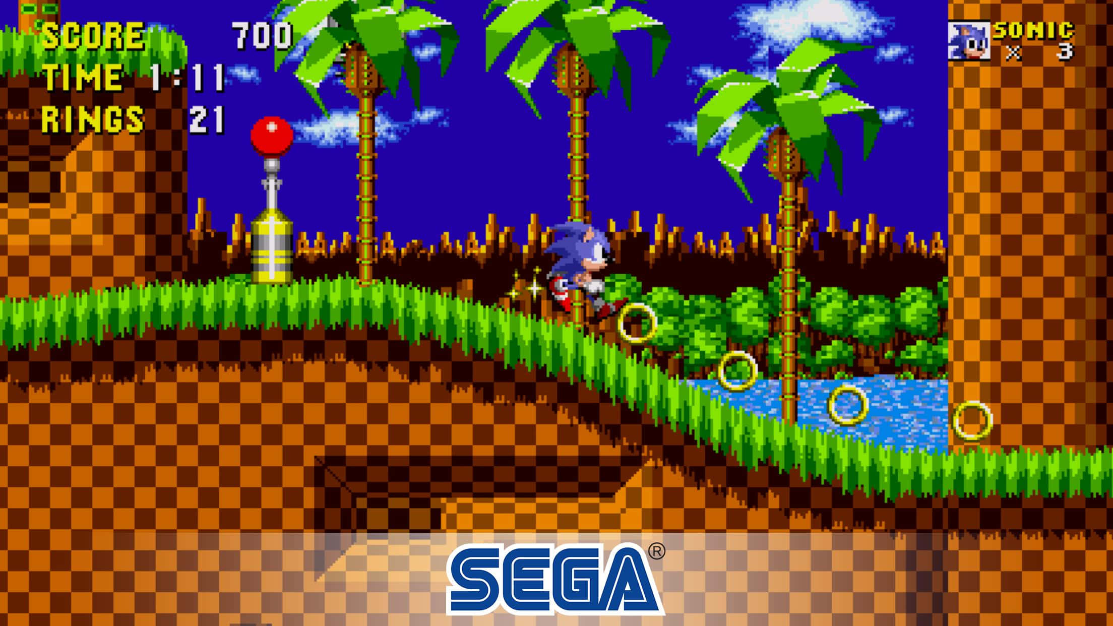 Sonic The Hedgehog 桌布 壁紙 — Sonic the Hedgehog 在一個有棕櫚樹、光環和藍天的像素化叢林關卡中奔跑。