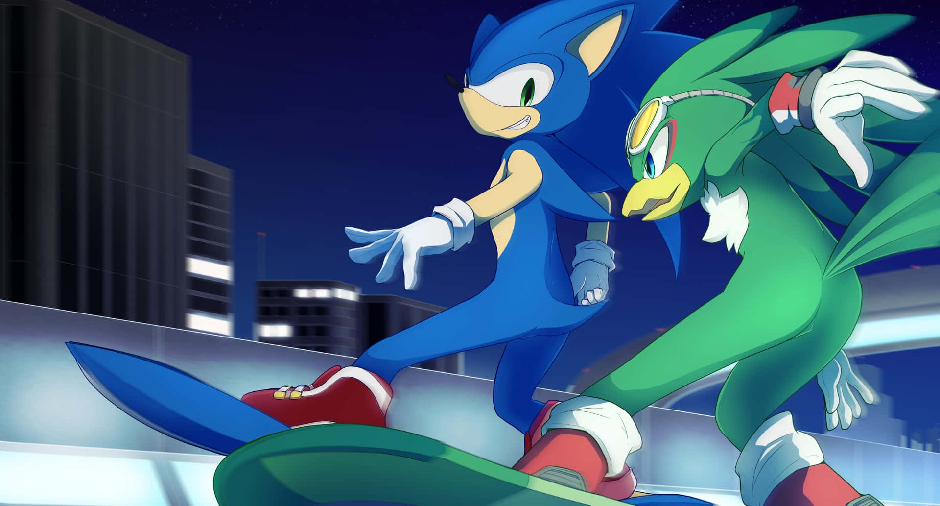 Jet The Hawk 桌布 壁紙 — Sonic 和 Tails 在夜晚乘著衝浪板穿過一個閃爍著霓虹燈光的未來城市景觀。