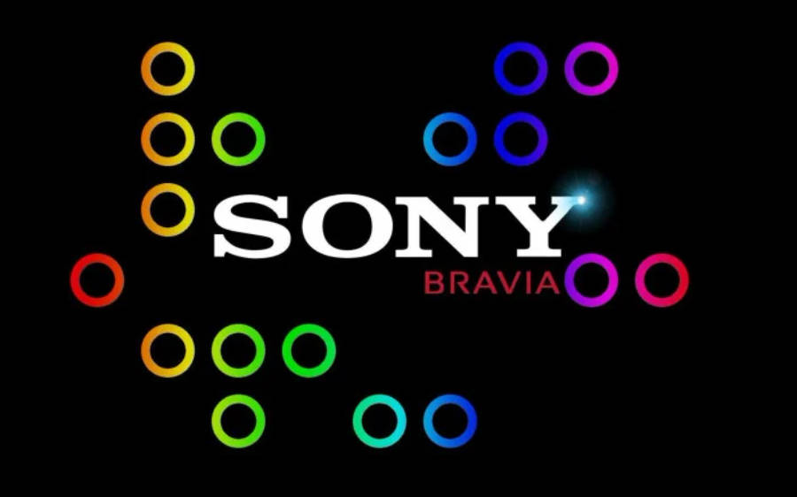 彩虹 桌布 壁紙 — Sony Bravia 標誌被彩色發光圓圈包圍在黑色背景上。