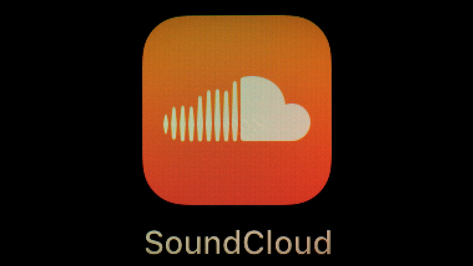 soundcloud 桌布 壁紙 — SoundCloud 應用程式圖示，橙色發光，帶有白色雲朵和聲波，背景為黑色。