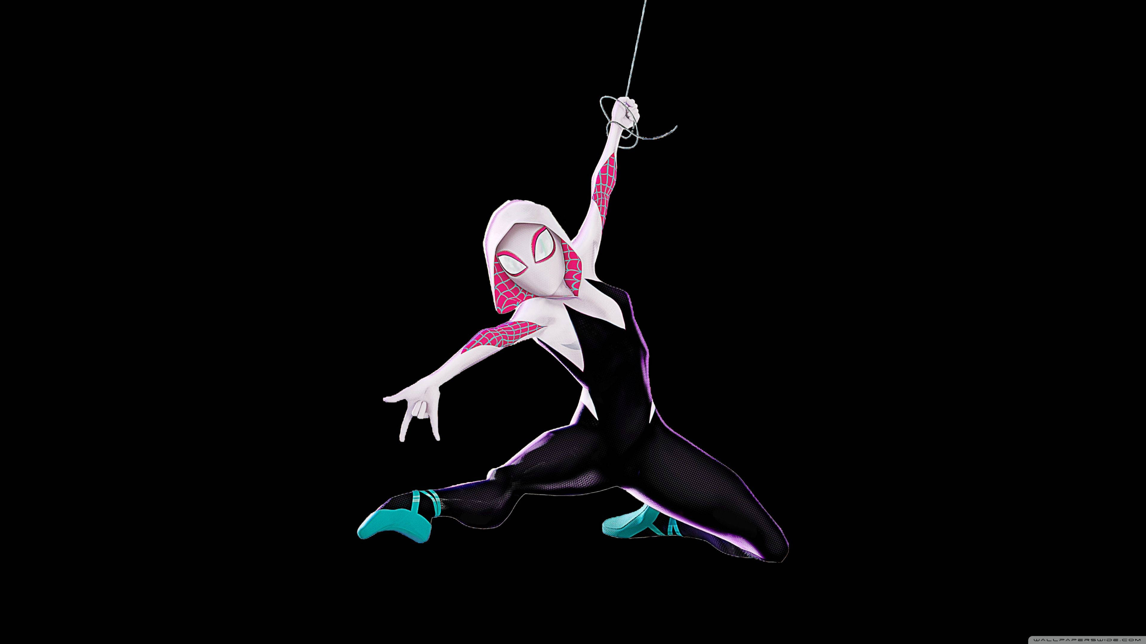 蜘蛛關 桌布 壁紙 — Spider-Gwen 在純黑背景下以其標誌性的白色、粉紅色和藍綠色戰衣動態擺盪。