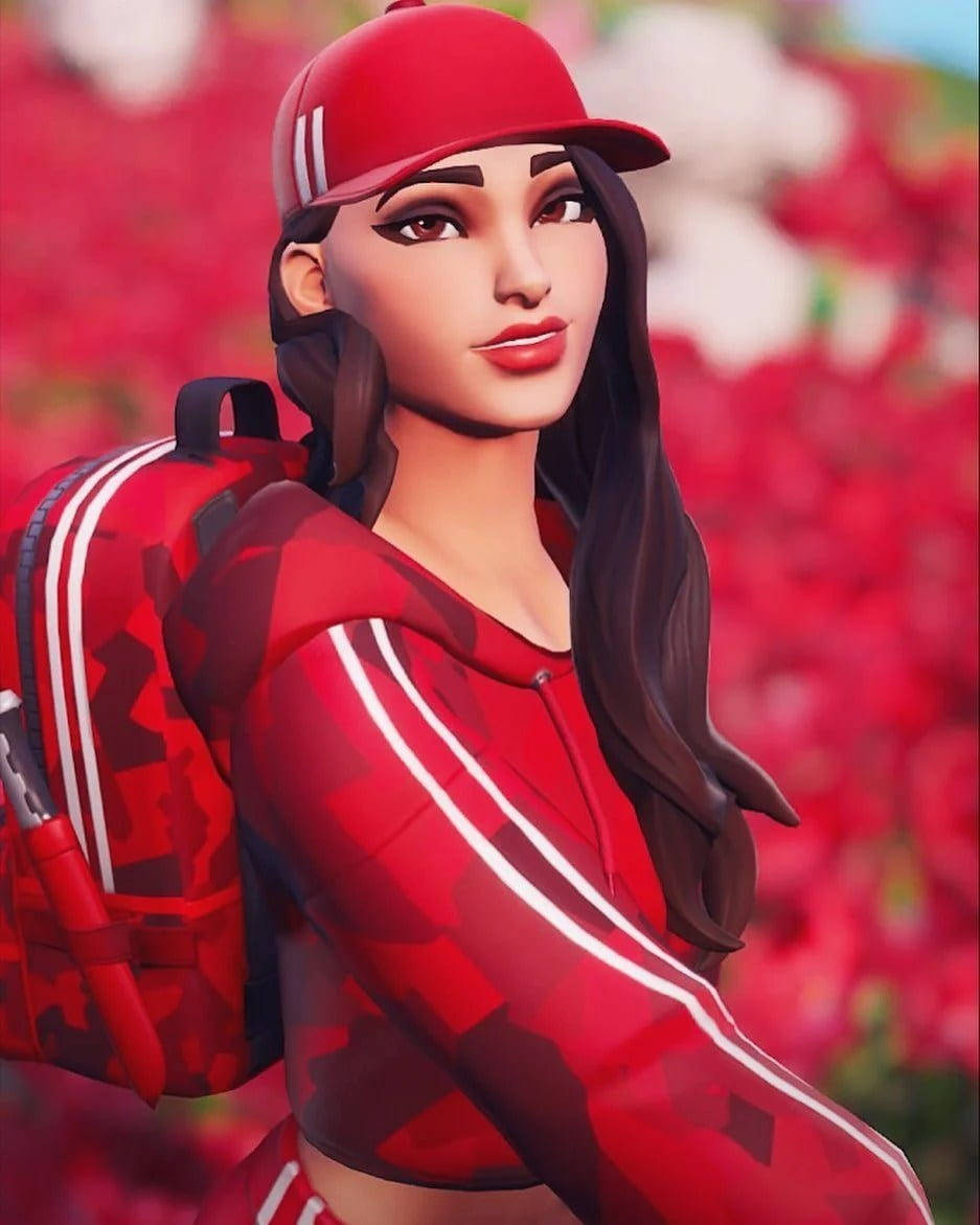 一位身穿紅色迷彩服和帽子的女性遊戲玩家站在紅色花田中。 — Fortnite 壁紙