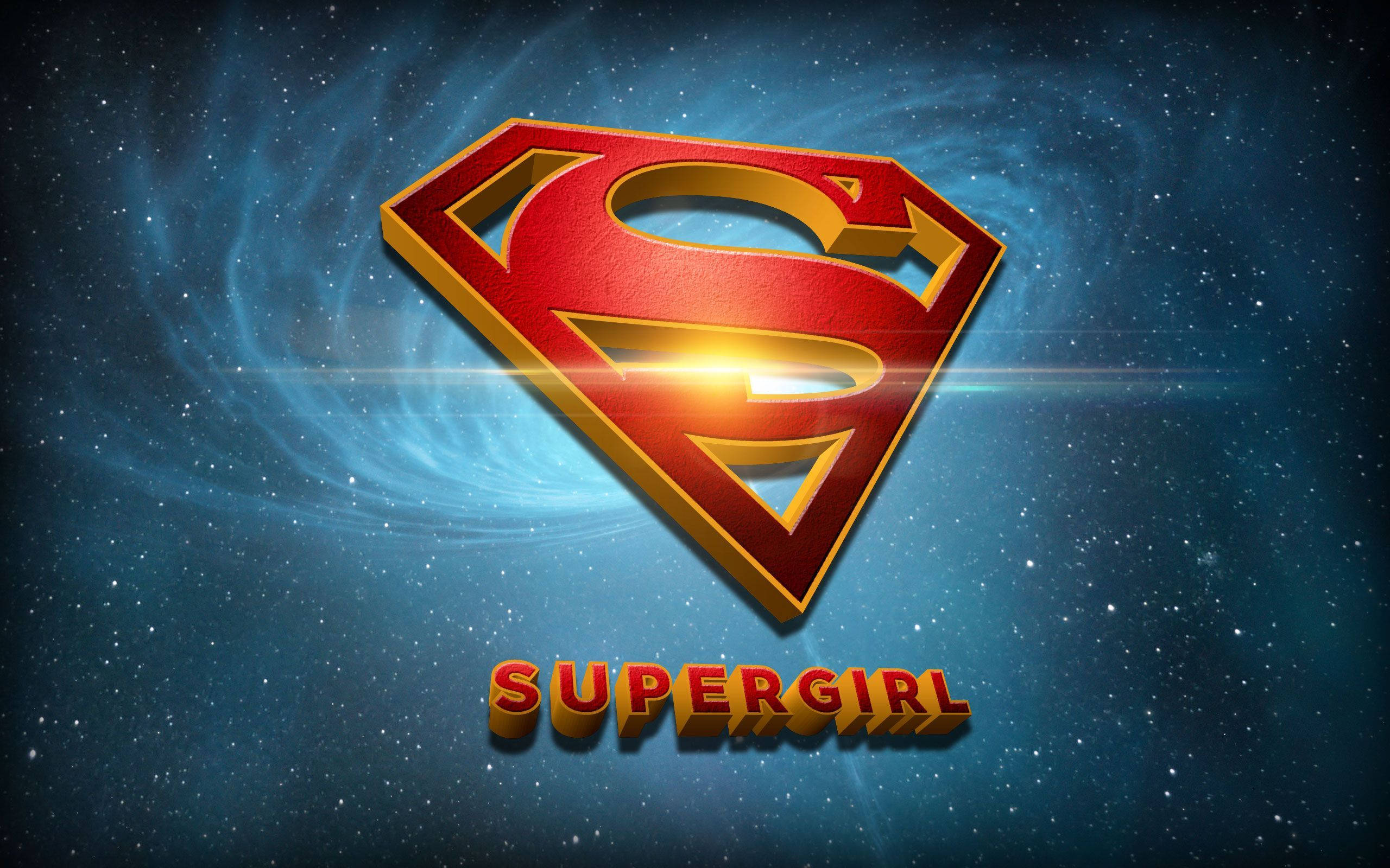 Superwoman 桌布 壁紙 — Supergirl 標誌在旋轉的宇宙藍色星空背景下發出金色光芒。