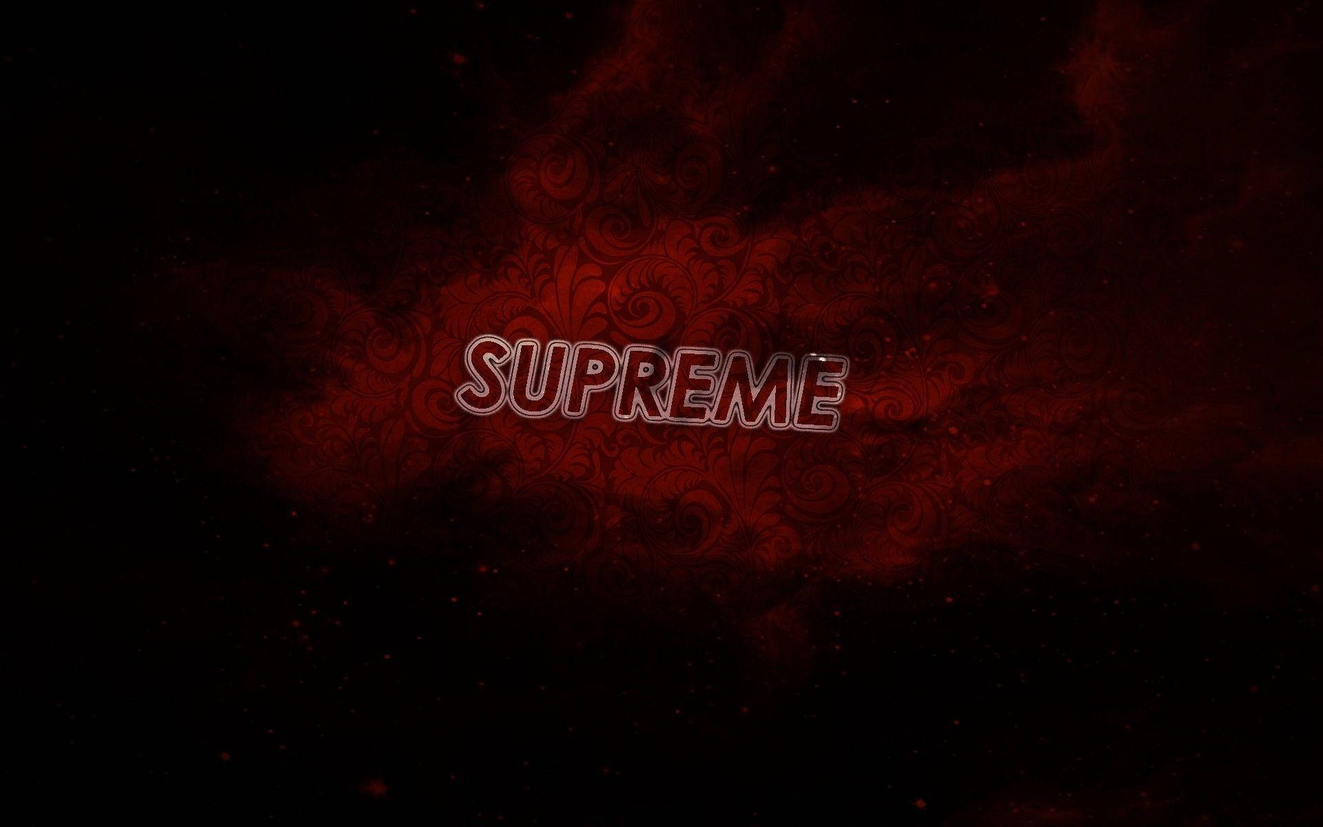 哥德式動圖 桌布 壁紙 — 「supreme」一詞在帶有旋轉華麗圖案和漂浮粒子的深色背景上發出紅色光芒。