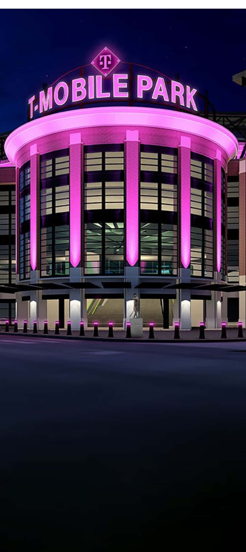  壁紙 — T-Mobile Park 在漆黑的夜空下閃爍著充滿活力的粉紅色霓虹燈，照亮其現代彎曲的外牆。