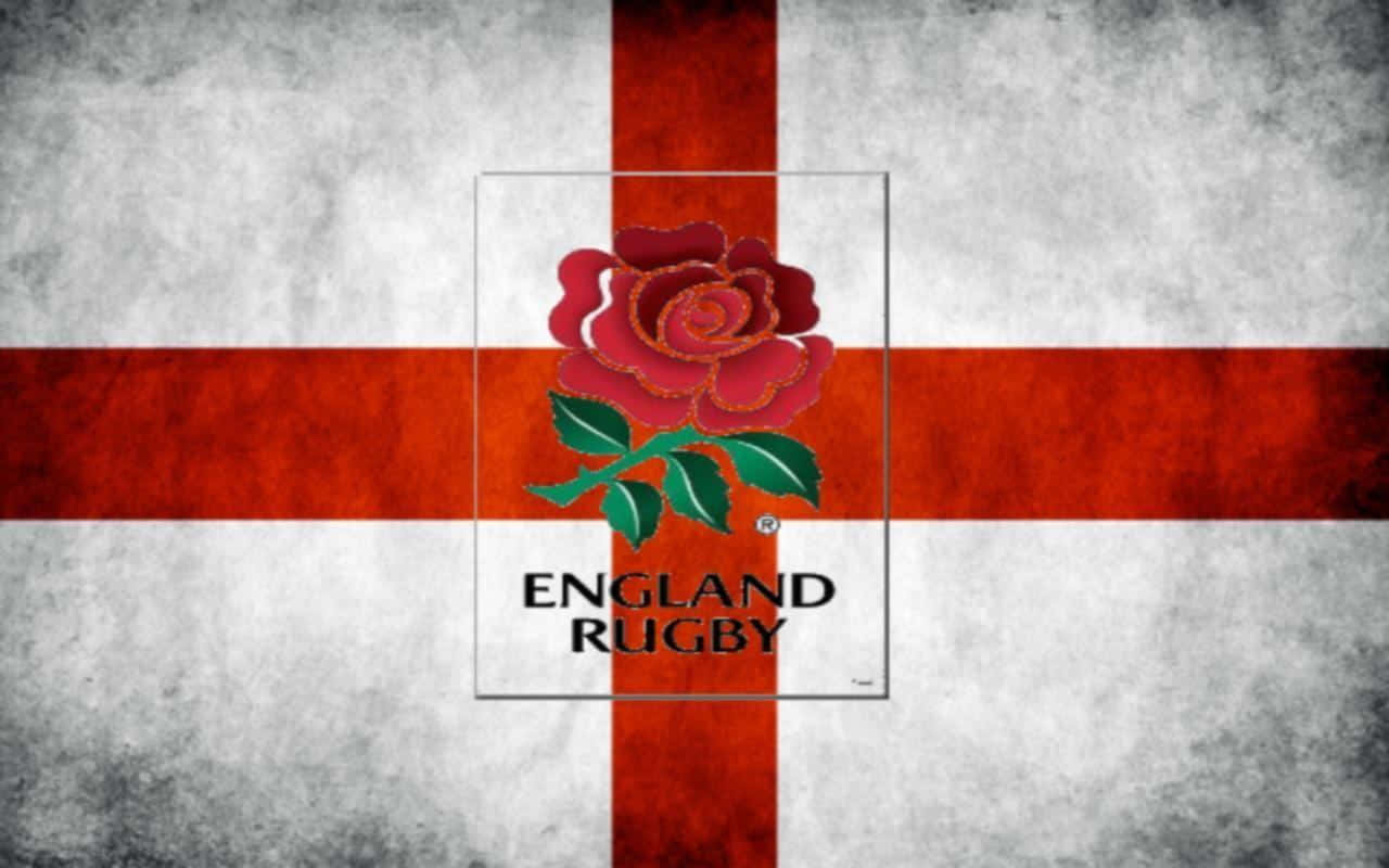 England Rugby 桌布 壁紙 — 帶有紋理的英格蘭橄欖球旗，白色十字中央有紅色玫瑰徽章，背景為風化灰色。