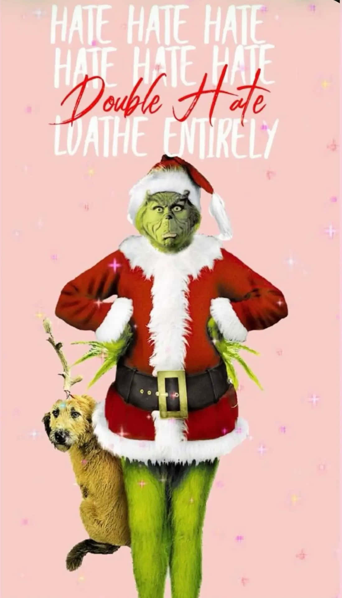  壁紙 — 聖誕怪傑穿著聖誕老人套裝，雙手叉腰站在粉紅色背景前，文字寫著「HATE Double Hate LOATHE ENTIRELY」。