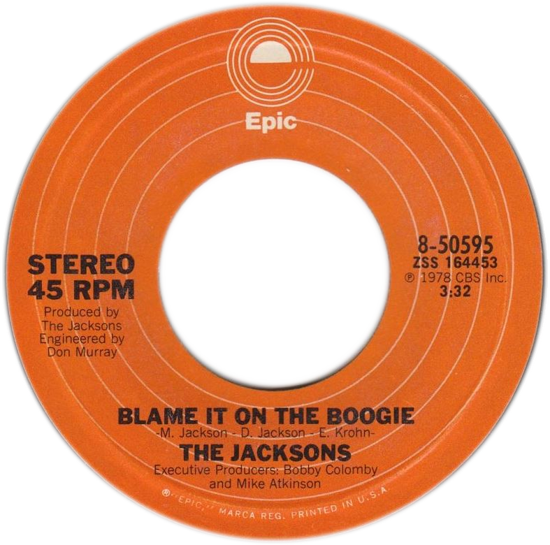 麥可·傑克森 桌布 壁紙 — The Jacksons 歌曲《Blame It On The Boogie》的復古橙色 45 RPM 唱片標籤，帶有同心圓和粗體黑色文字。