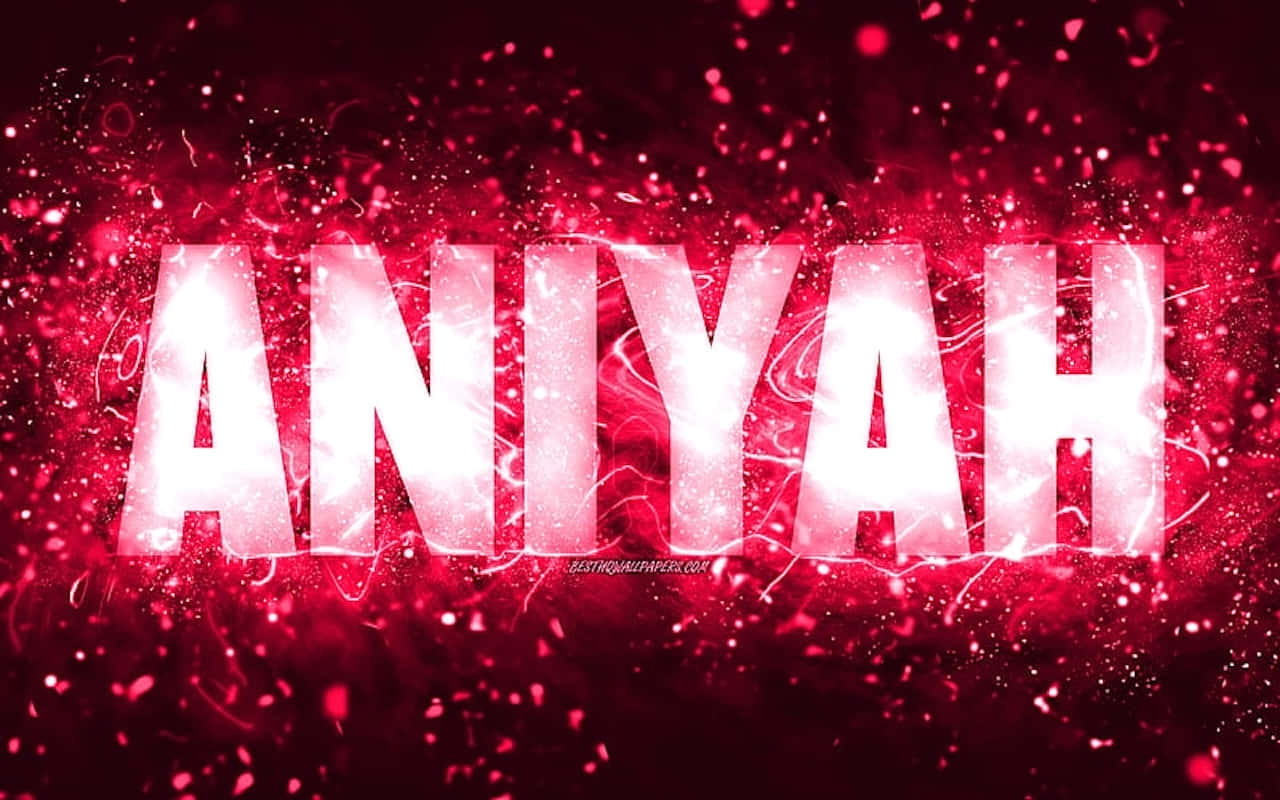  壁紙 — 名字 ANIYAH 在充滿活力的紅色閃亮背景上發出電光般的白光。