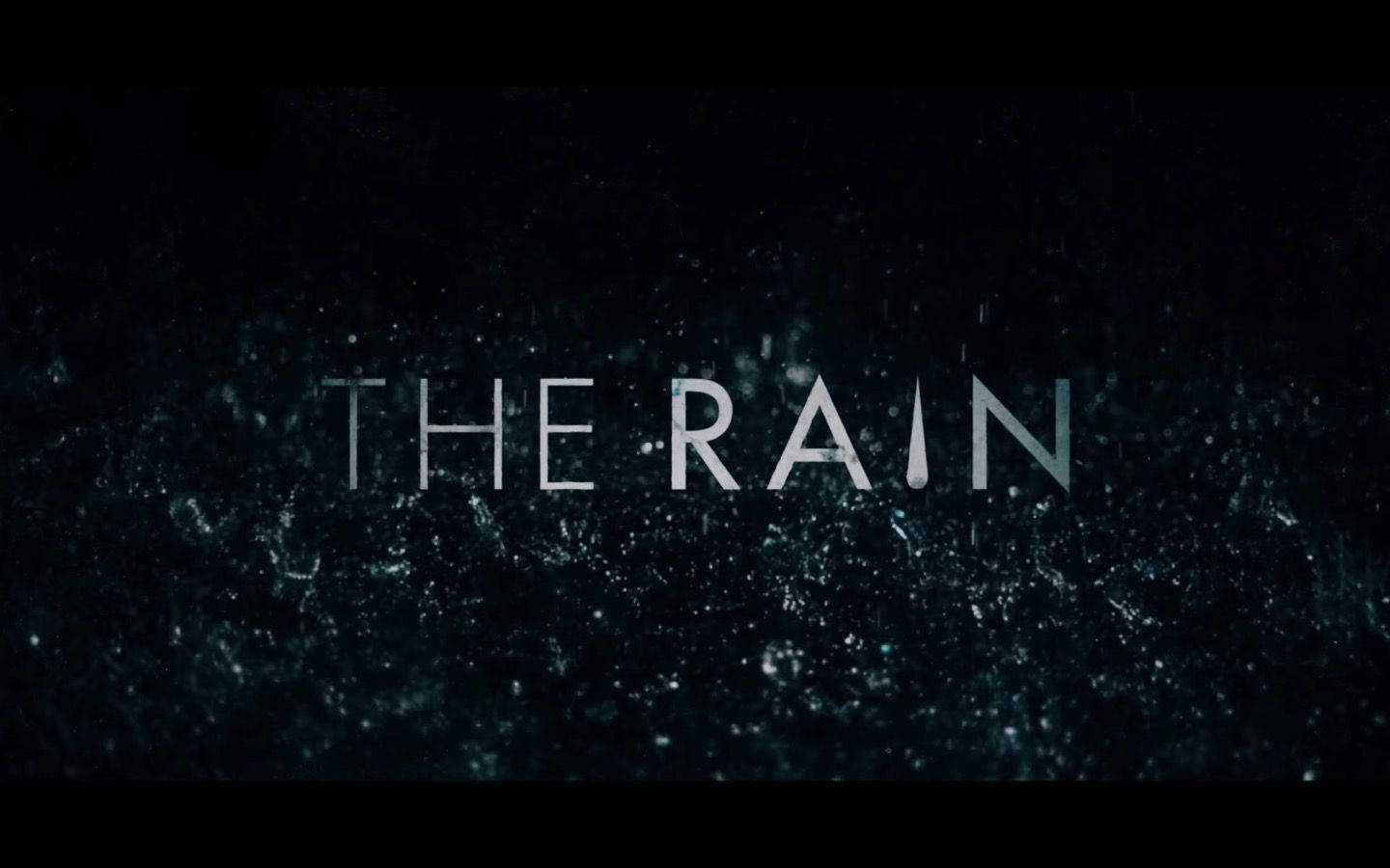 Netflix 桌布 壁紙 — 「THE RAIN」這個詞在黑暗紋理背景上微弱發光，伴隨著落下的水滴。
