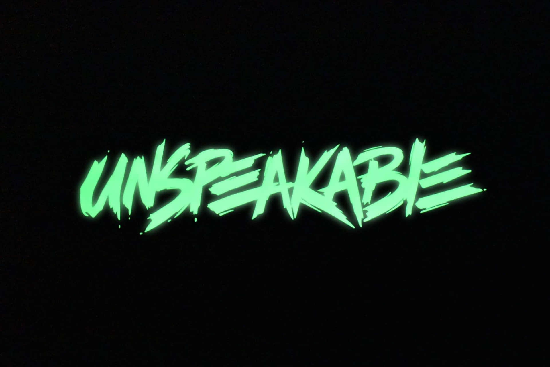  壁紙 — 「UNSPEAKABLE」一詞以鋸齒狀霓虹綠色在漆黑背景上發光。