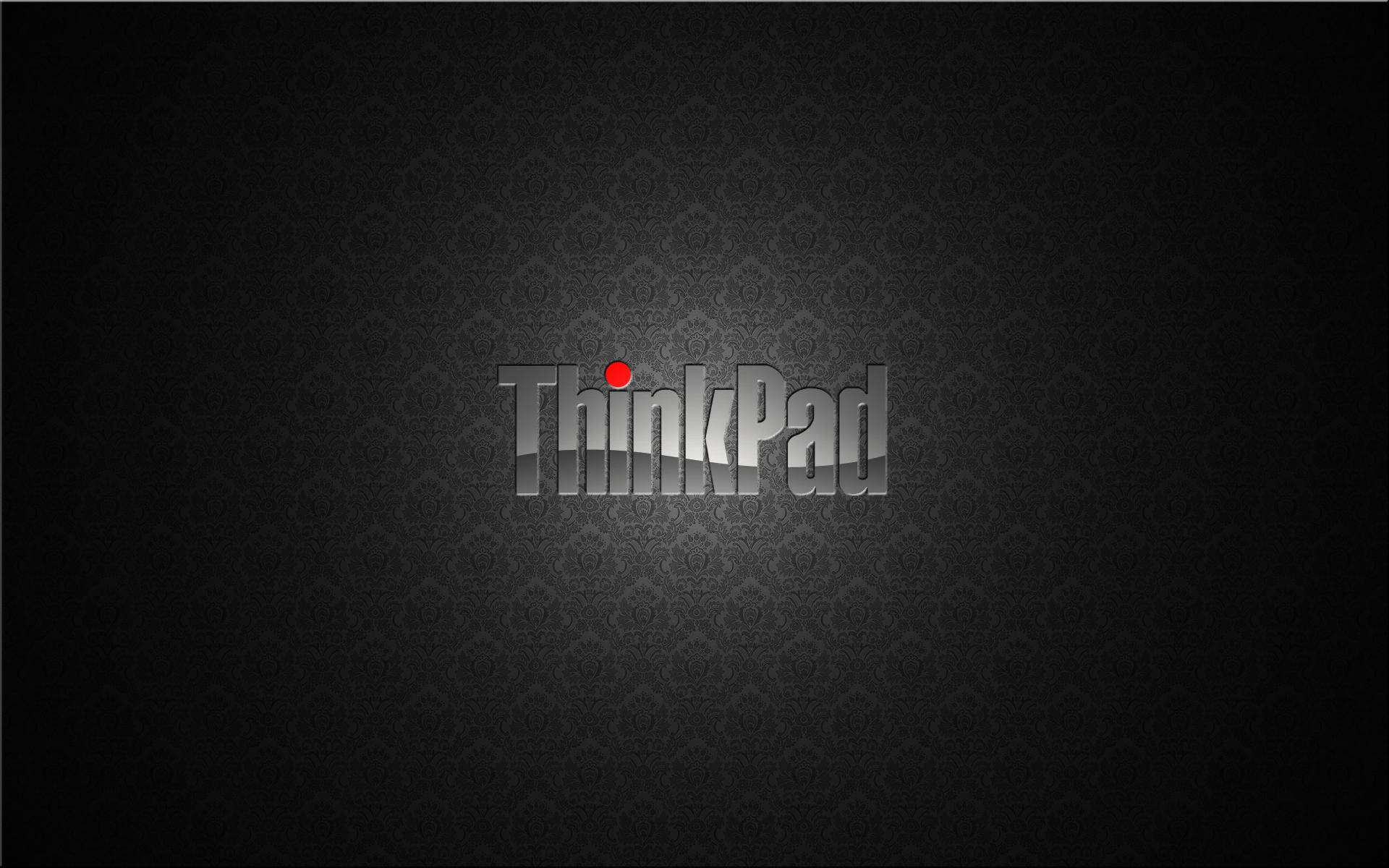 ThinkPad 標誌，紅色圓點，位於深色紋理背景上。