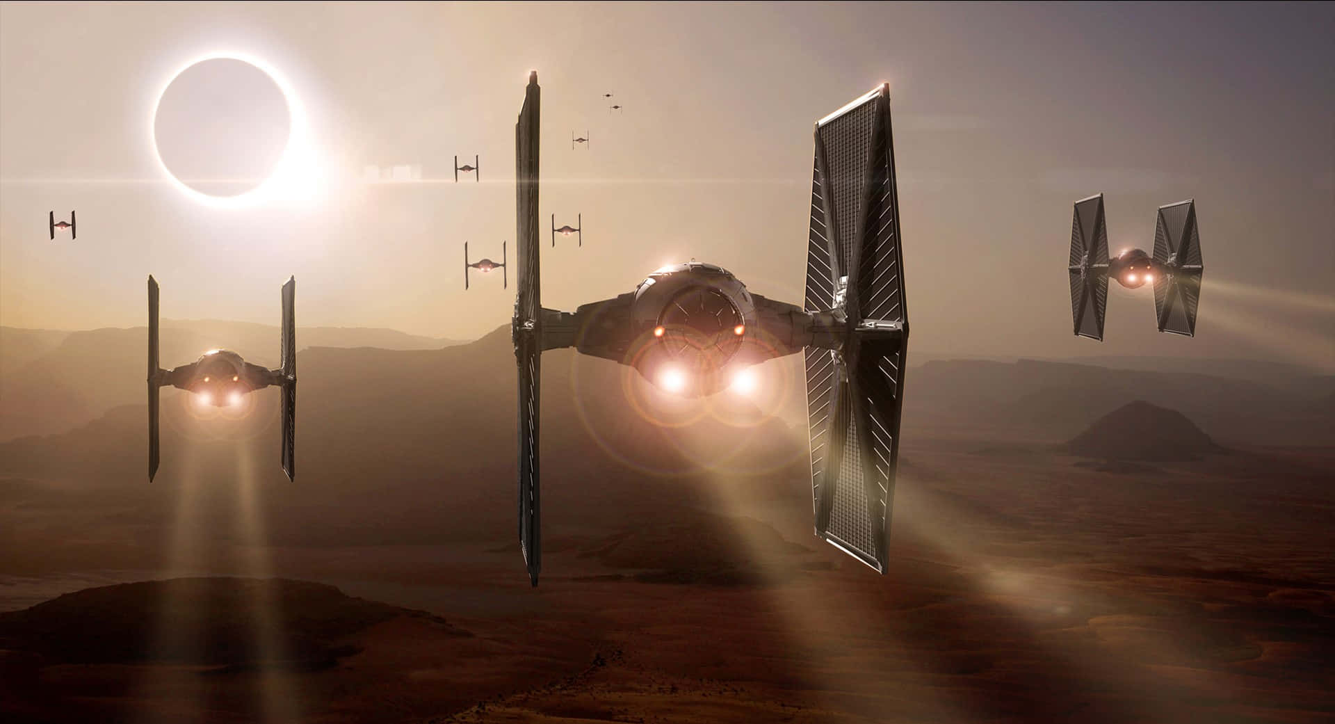 Jakku 桌布 壁紙 — TIE 戰機在沙漠行星上空飛翔，天空中有發光的太陽和一個帶環的行星。