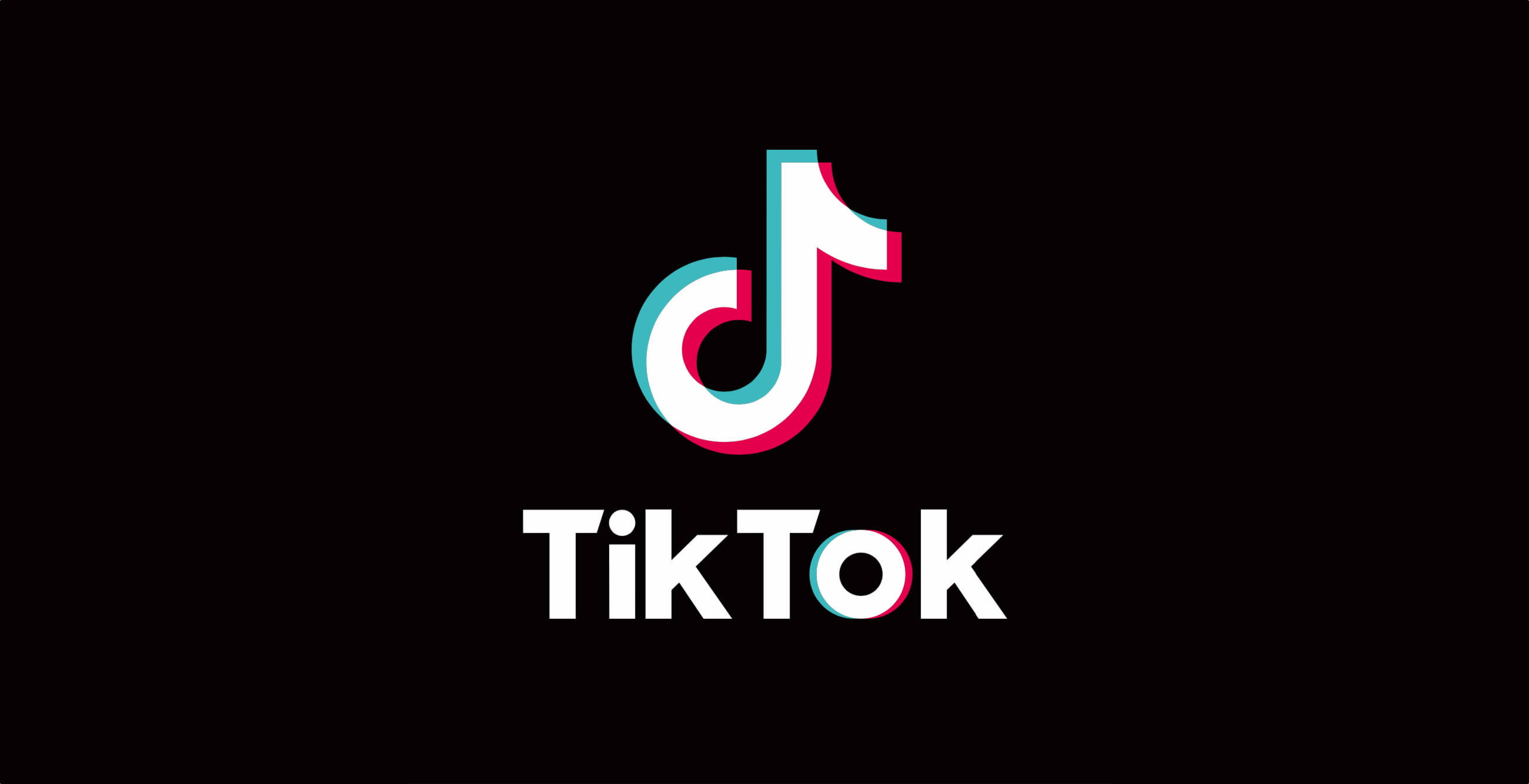 TikTok 動圖 桌布 壁紙 — TikTok 標誌，帶有彩色音符圖示和文字，背景為黑色。