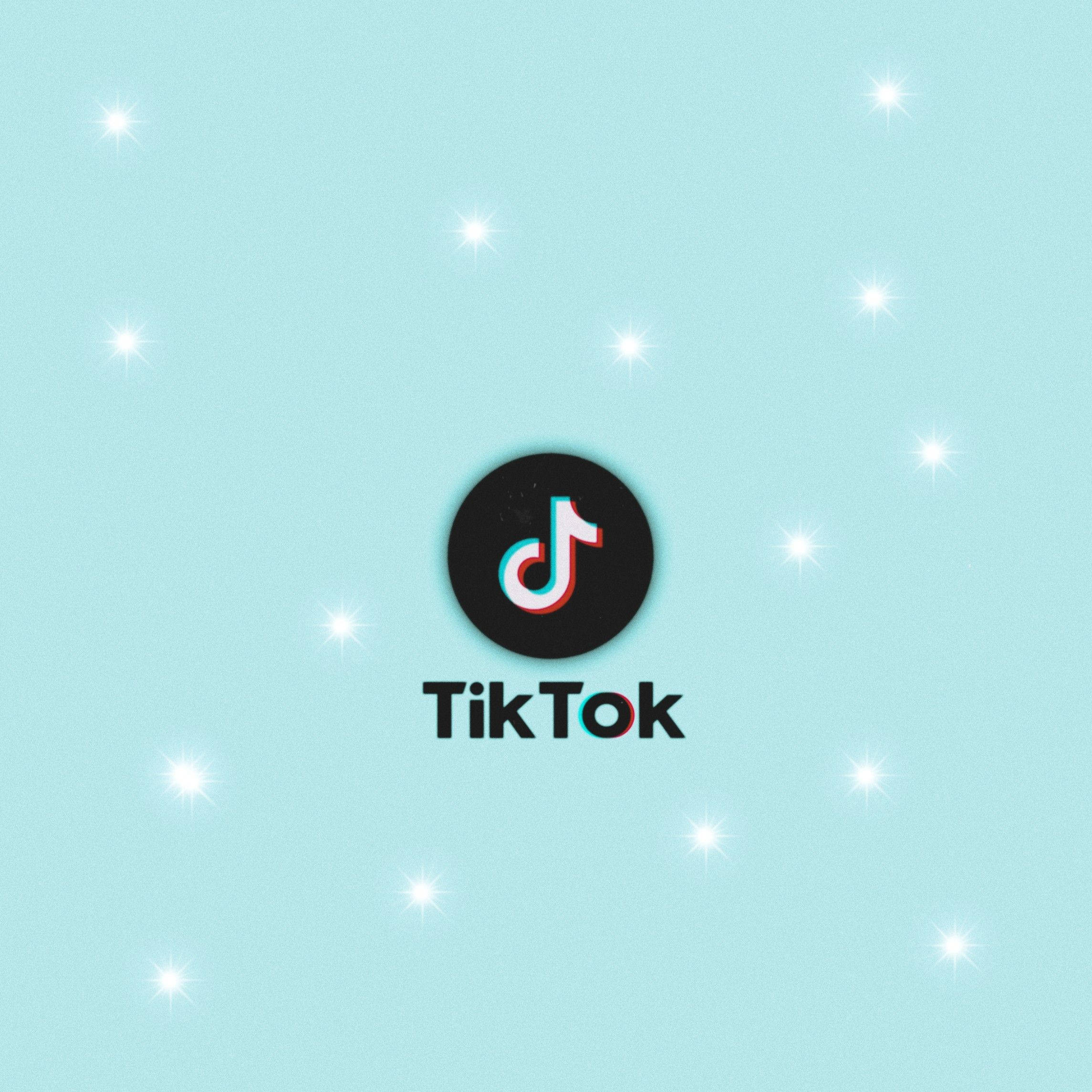 TikTok 動圖 桌布 壁紙 — TikTok 標誌居中於淺藍色背景上，帶有閃爍的白色星星。
