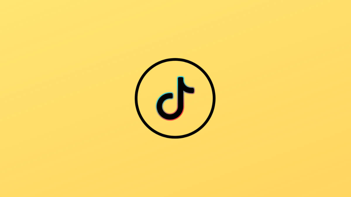TikTok Logo 桌布 壁紙 — TikTok 標誌居中於純黃色背景上，帶有微妙的色差效果。