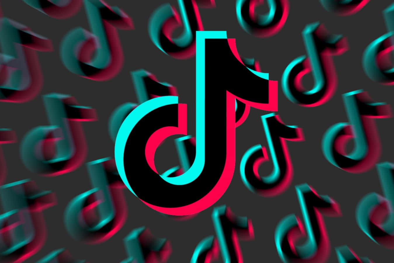 TikTok 標誌搭配大量藍色與紅色音符 壁紙