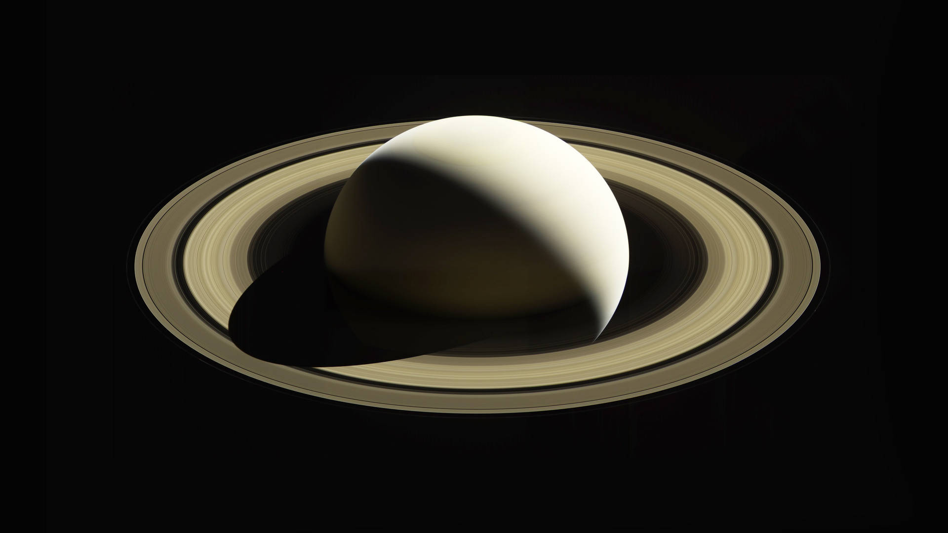 土星環在太空中投下陰影 — 土星 壁紙