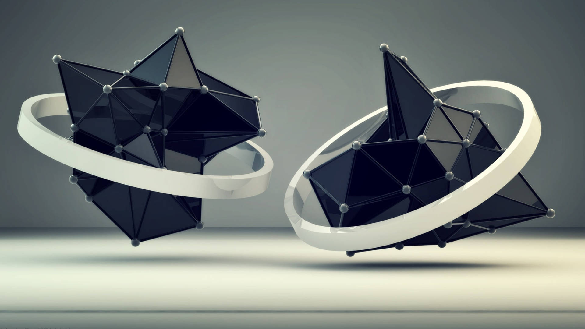 兩個黑色幾何星形漂浮在灰色工作室地板上的白色環中。 — 3D 壁紙
