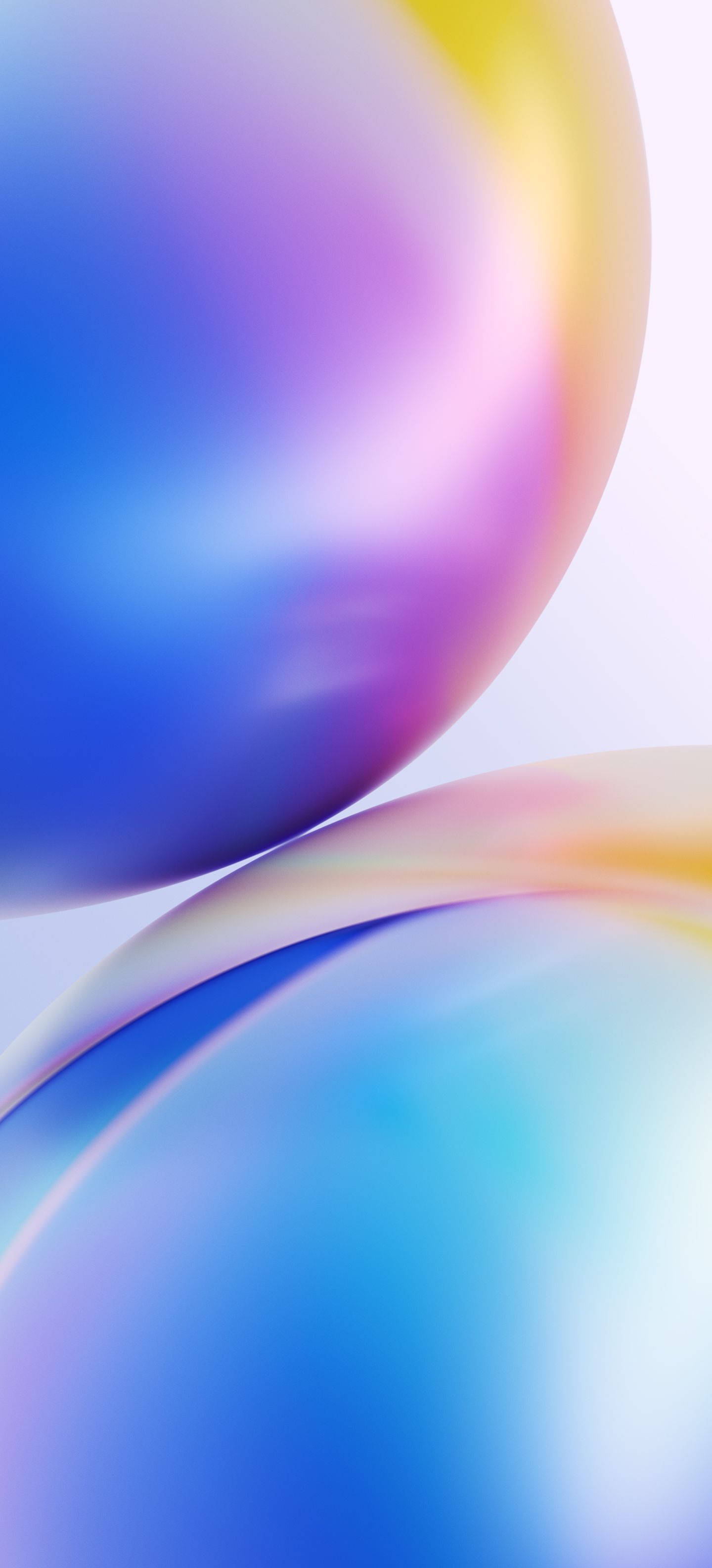 兩個重疊的彩色漸變球體，帶有柔和光線。 — 一加 壁紙