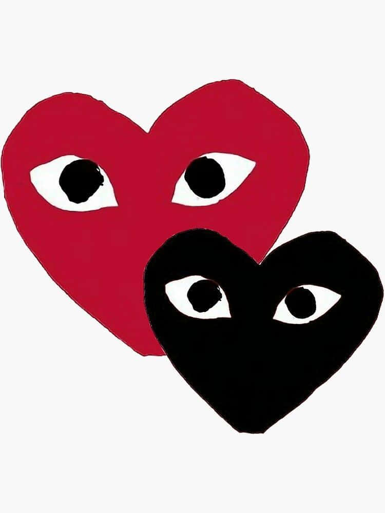 Bad Bunny Heart 桌布 壁紙 — 兩個風格化的心形，一個紅色一個黑色，每個都有大大的白色眼睛，在純色背景上直視前方。