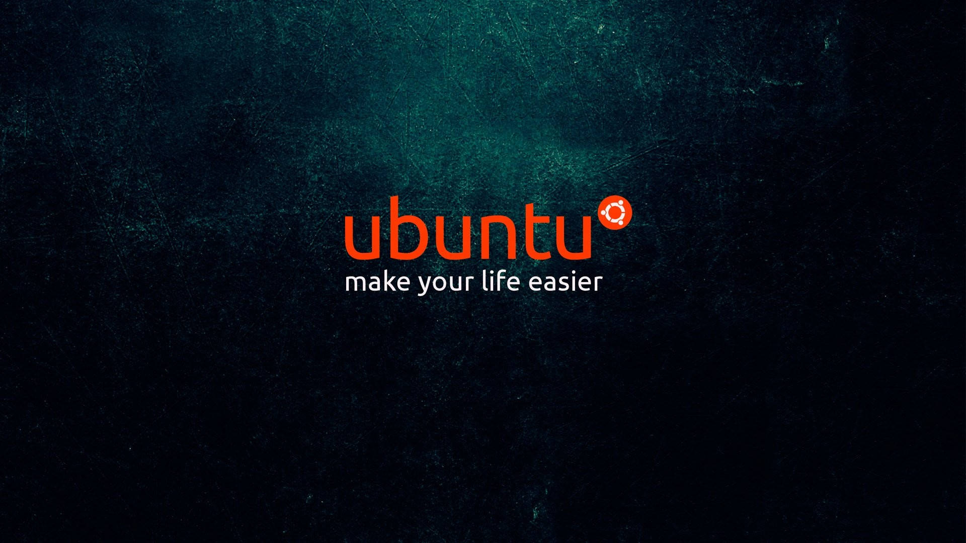 Linux 桌布 壁紙 — Ubuntu 標誌以橙色文字顯示在深色紋理青綠色背景上，附有標語讓你的生活更輕鬆。