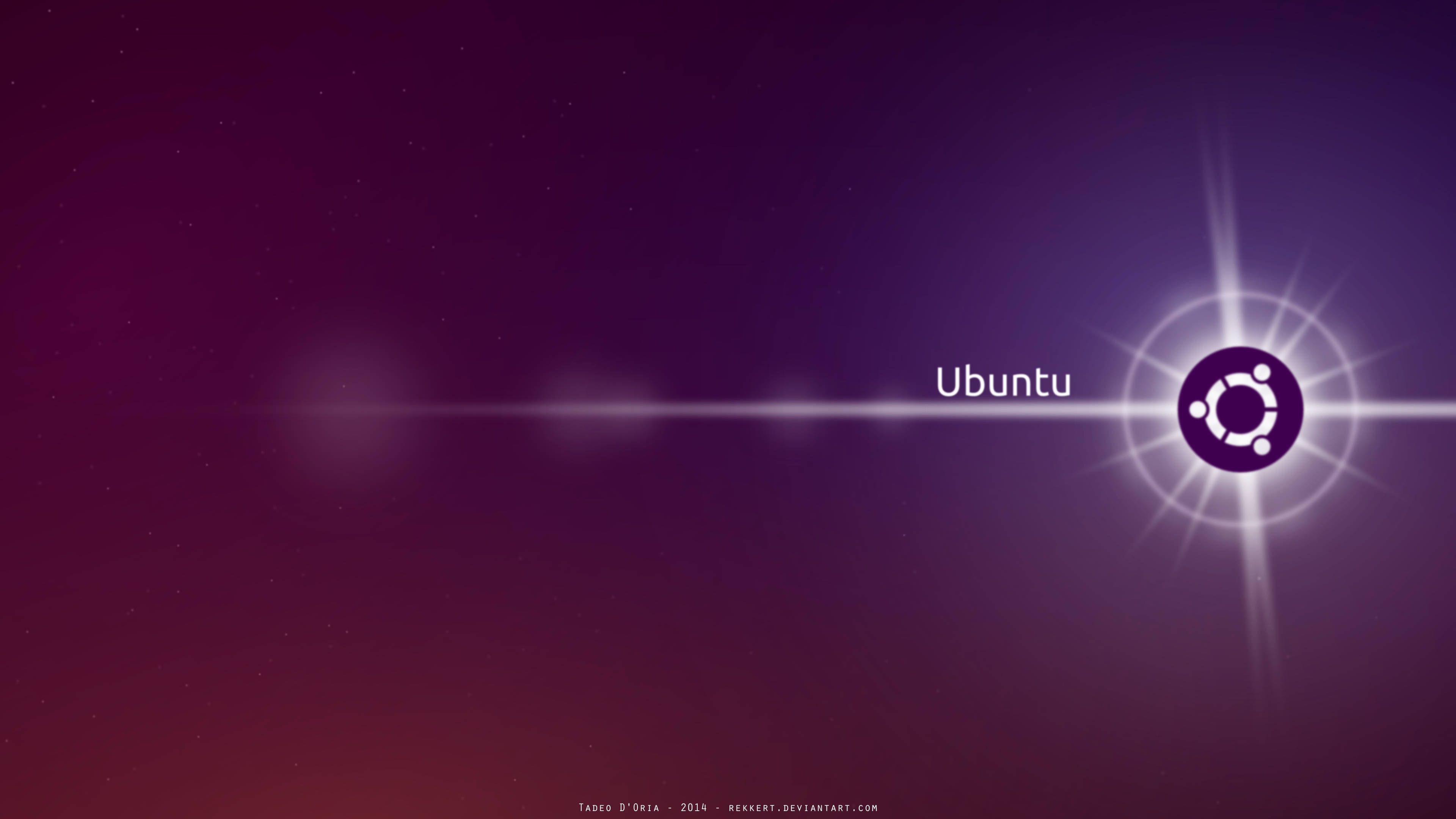 ubuntu 桌布 壁紙 — Ubuntu 標誌在漸變紫色和紅色的宇宙背景上發出耀眼的光芒。
