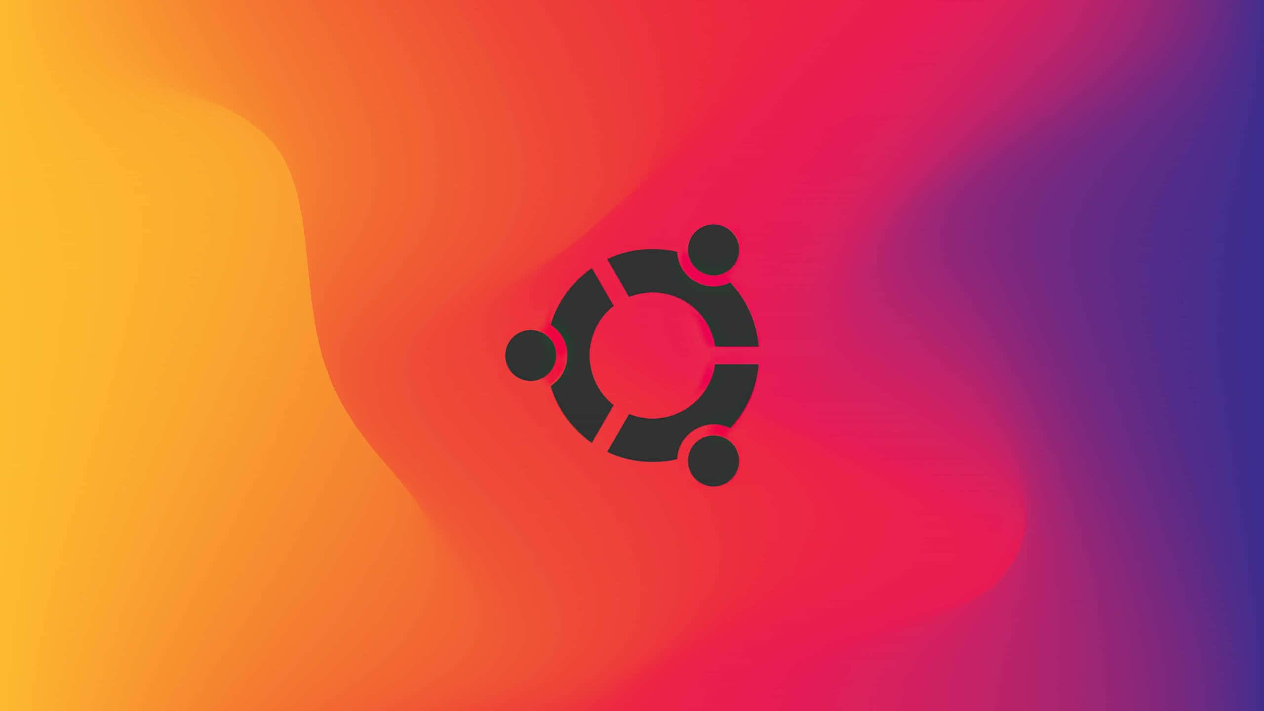 ubuntu 桌布 壁紙 — Ubuntu 標誌居中於從黃色到紫色的鮮豔漸變背景上。