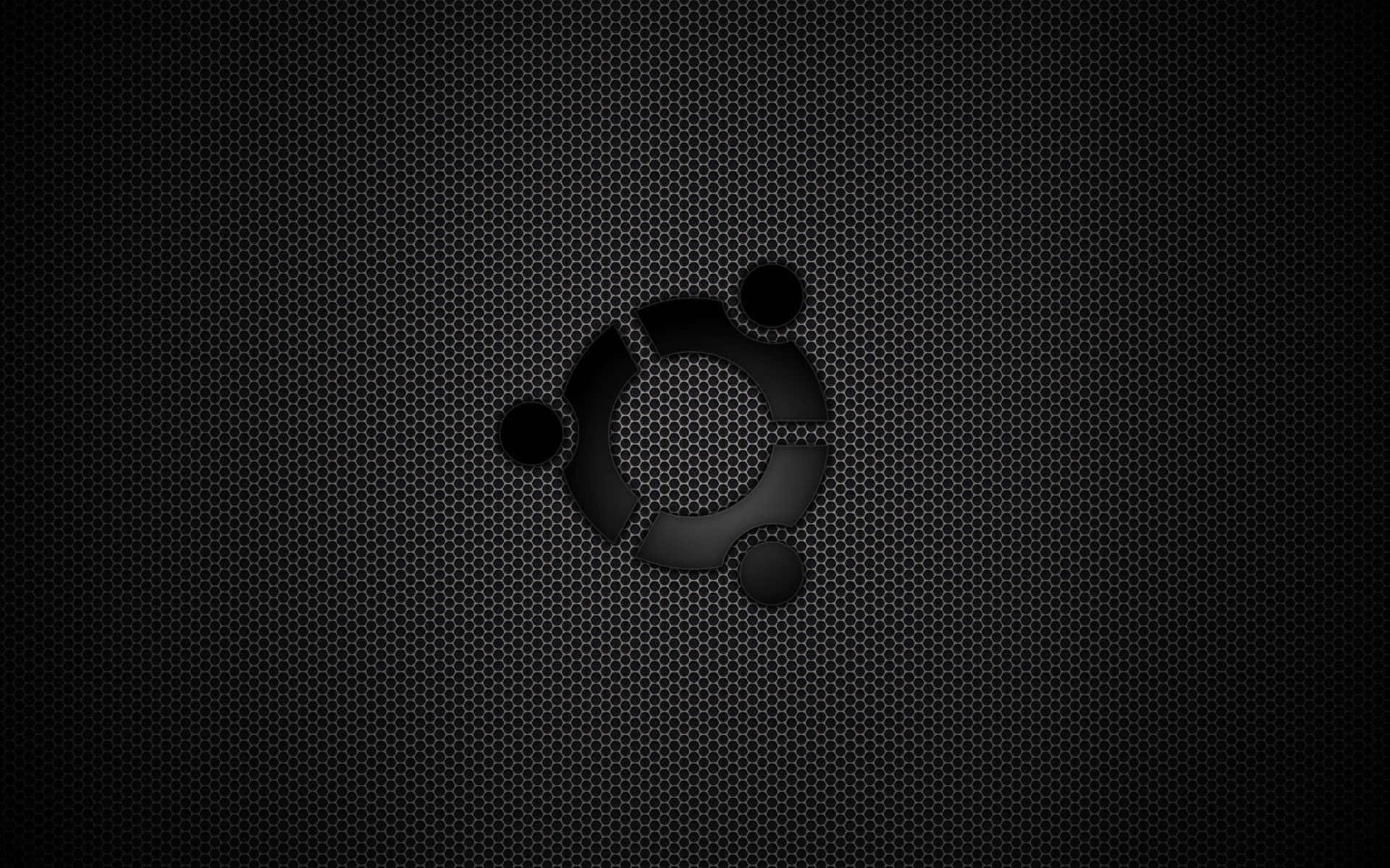 ubuntu 桌布 壁紙 — Ubuntu 標誌從帶有微妙照明和深度的深色六角形網格紋理中浮現。