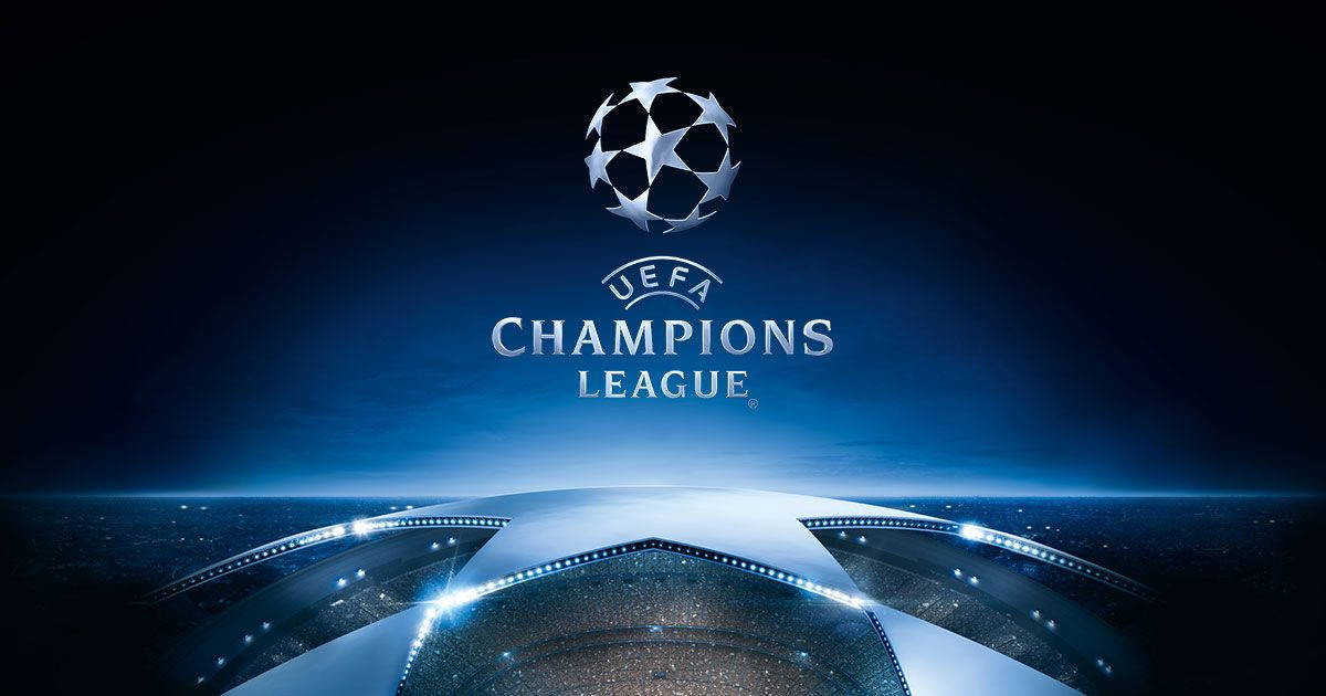Uefa 桌布 壁紙 — UEFA Champions League 標誌在深藍色夜空下，在未來主義體育場上方發光。