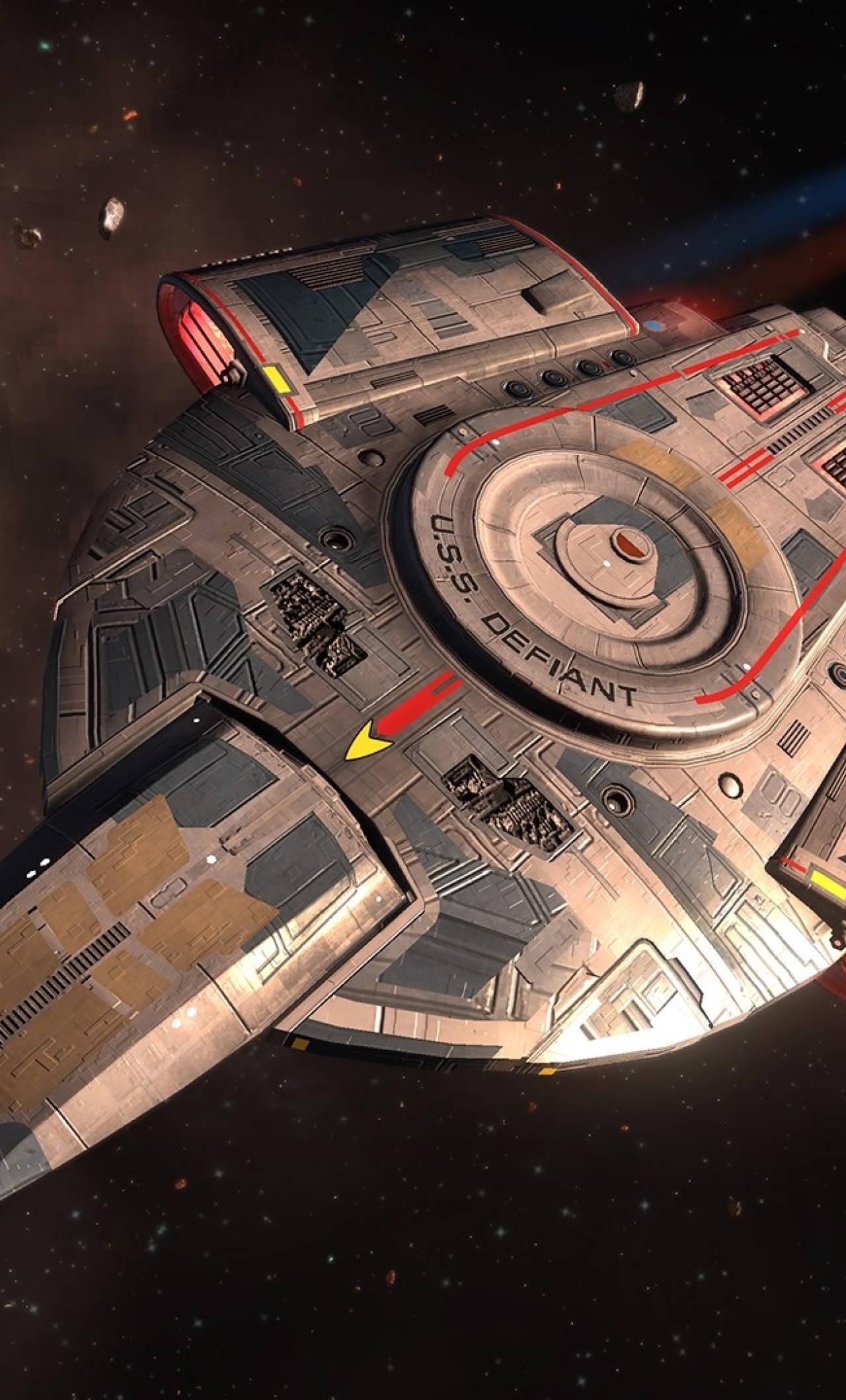 星際爭霸戰 iPhone 桌布 桌布 壁紙 — USS Defiant 星艦在深空中滑過星場，帶有發光的紅色點綴和小行星碎片。