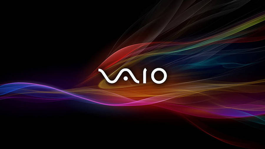 Sony 桌布 壁紙 — VAIO 標誌在黑色背景上發出白色光芒，周圍環繞著流動的鮮豔彩虹色絲帶。