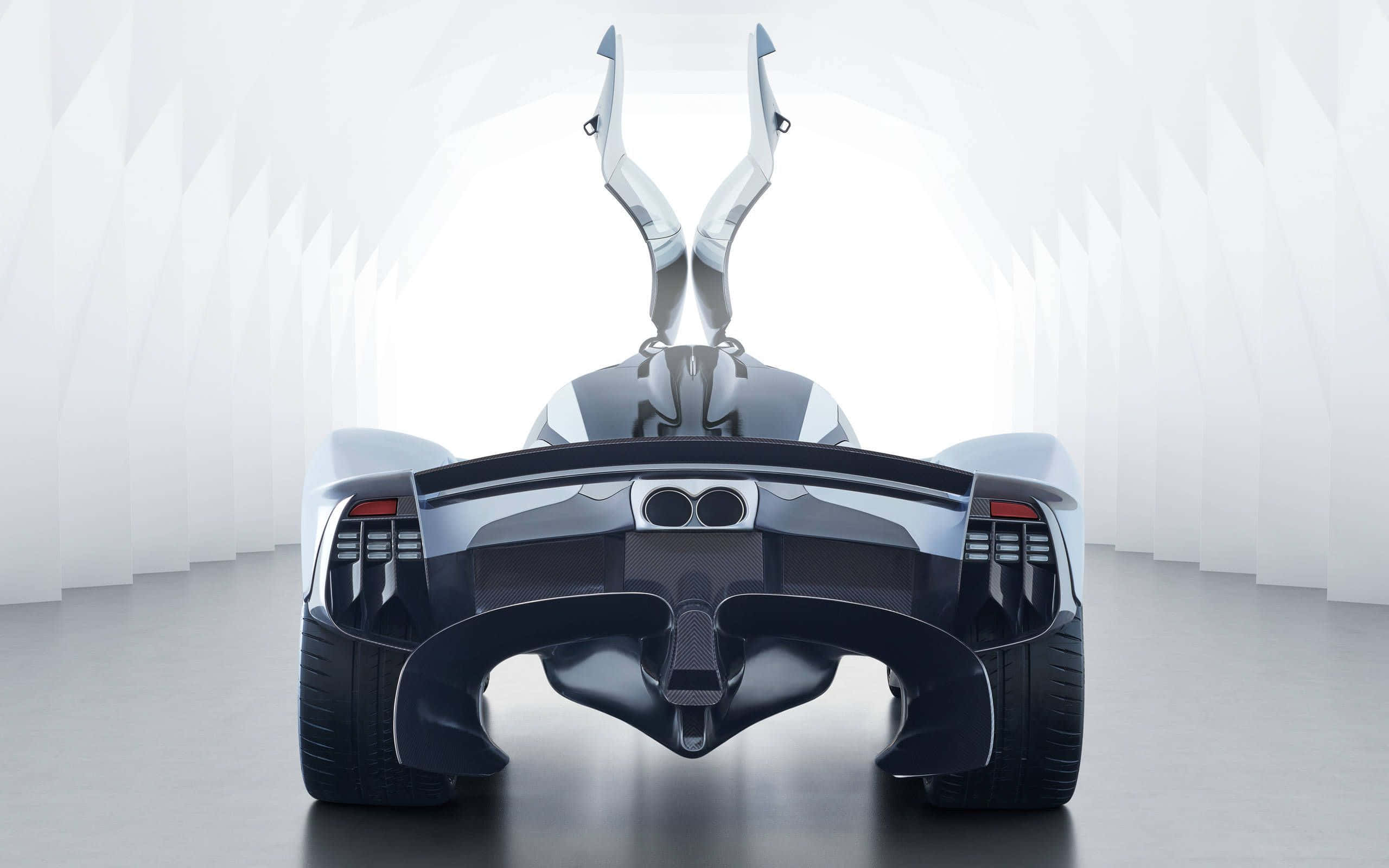 奧斯頓馬丁Valkyrie——汽車工程的巔峰 壁紙 — 一輛時尚的未來感跑車，鷗翼門打開，停在簡約的白色隧道中。