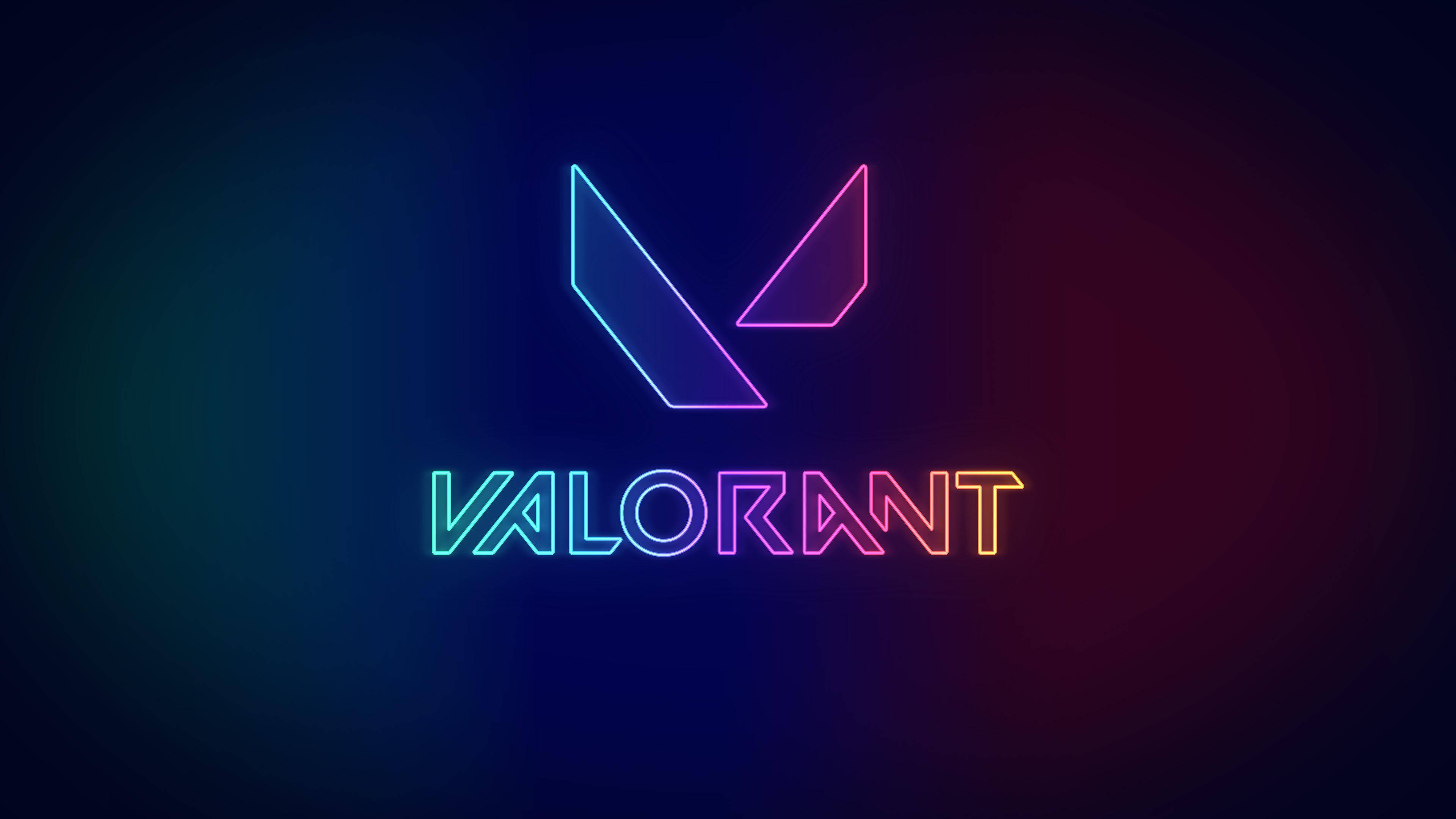 valorant 2k 桌布 壁紙 — Valorant 的鮮豔霓虹標誌在帶有藍色和粉紅色調的深色漸變背景上發光。