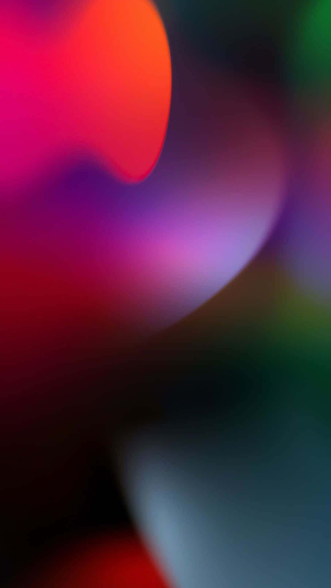  壁紙 — 充滿活力的抽象散景，在深色背景上呈現發光的紅色、粉紅色、紫色和綠色光跡。