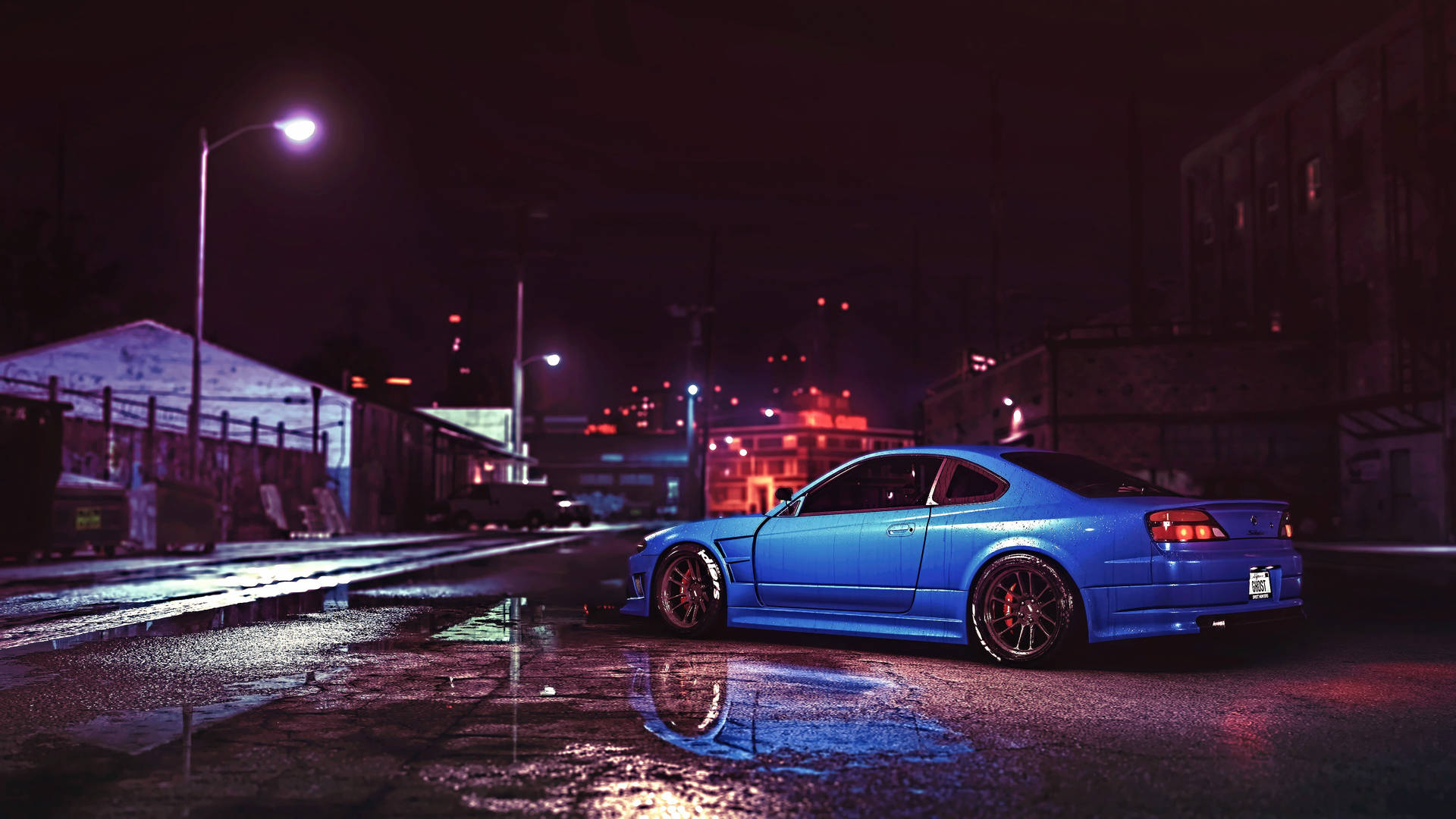 藍色跑車停在夜晚潮濕的城市街道上，帶有霓虹燈反射。 — JDM汽車 壁紙