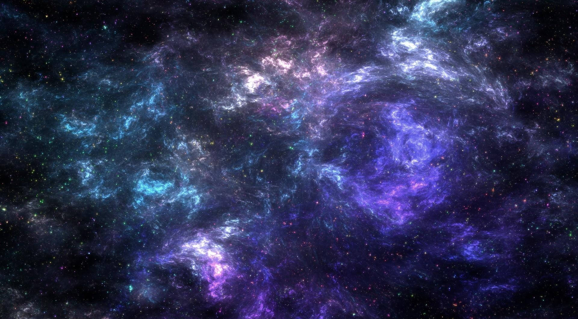 色彩繽紛的宇宙星雲，帶有旋轉的藍色和紫色雲層以及散落的星星。 — 宇宙 壁紙