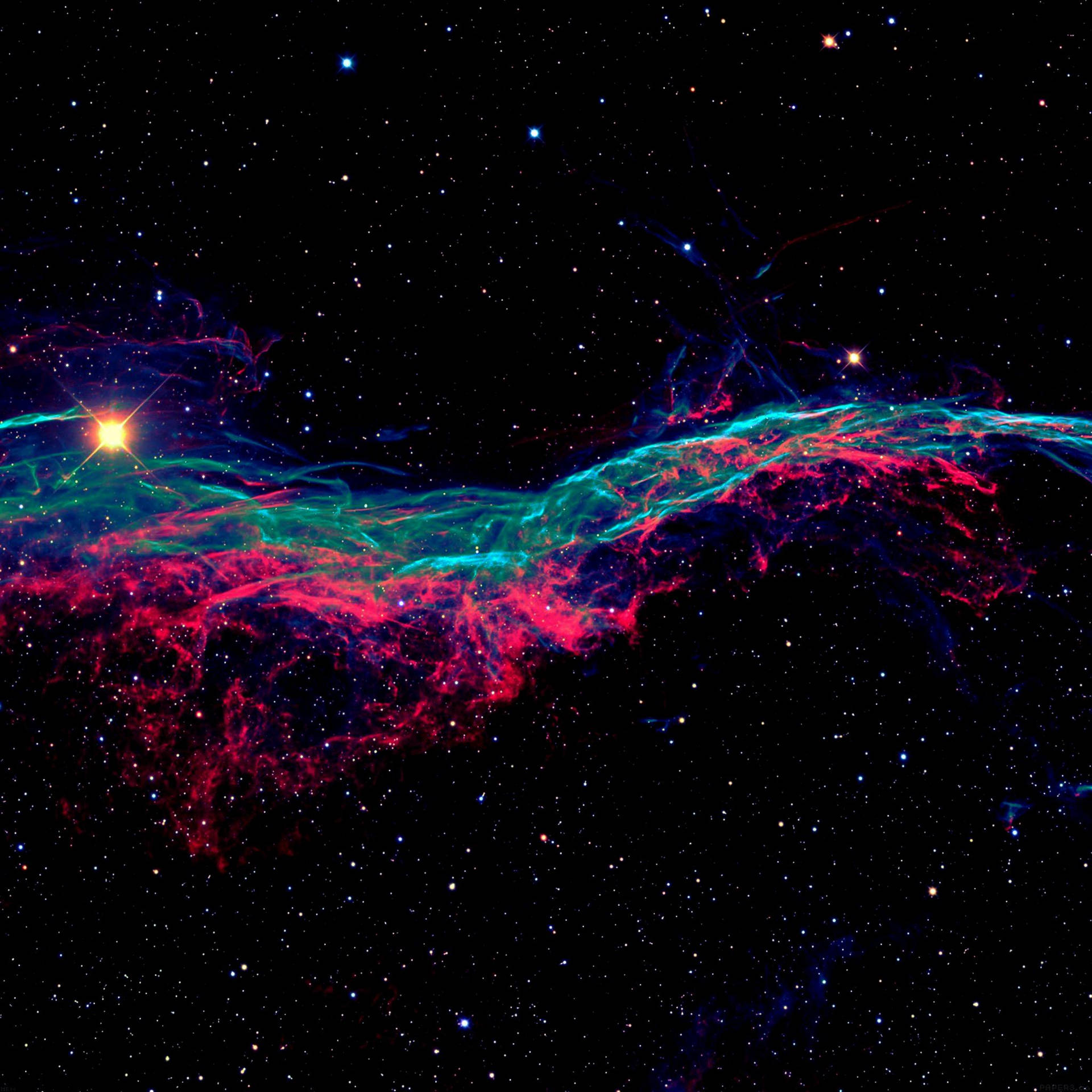 在深空中，明亮的星星伴隨著充滿活力的粉紅和藍綠色星雲。 — Amoled 壁紙