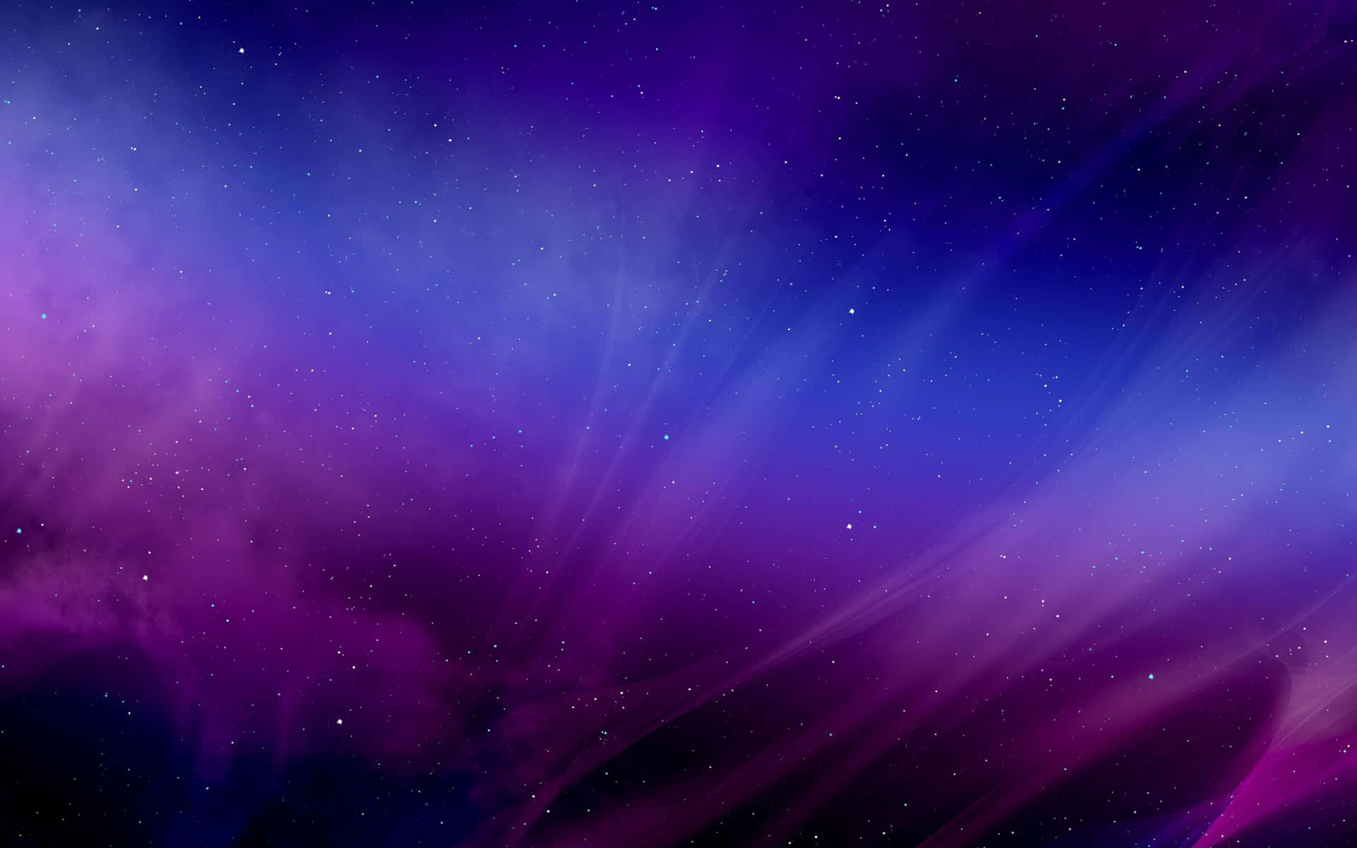  壁紙 — 充滿活力的宇宙星雲，帶有旋轉的紫色和藍色雲朵，點綴著閃爍的星星。