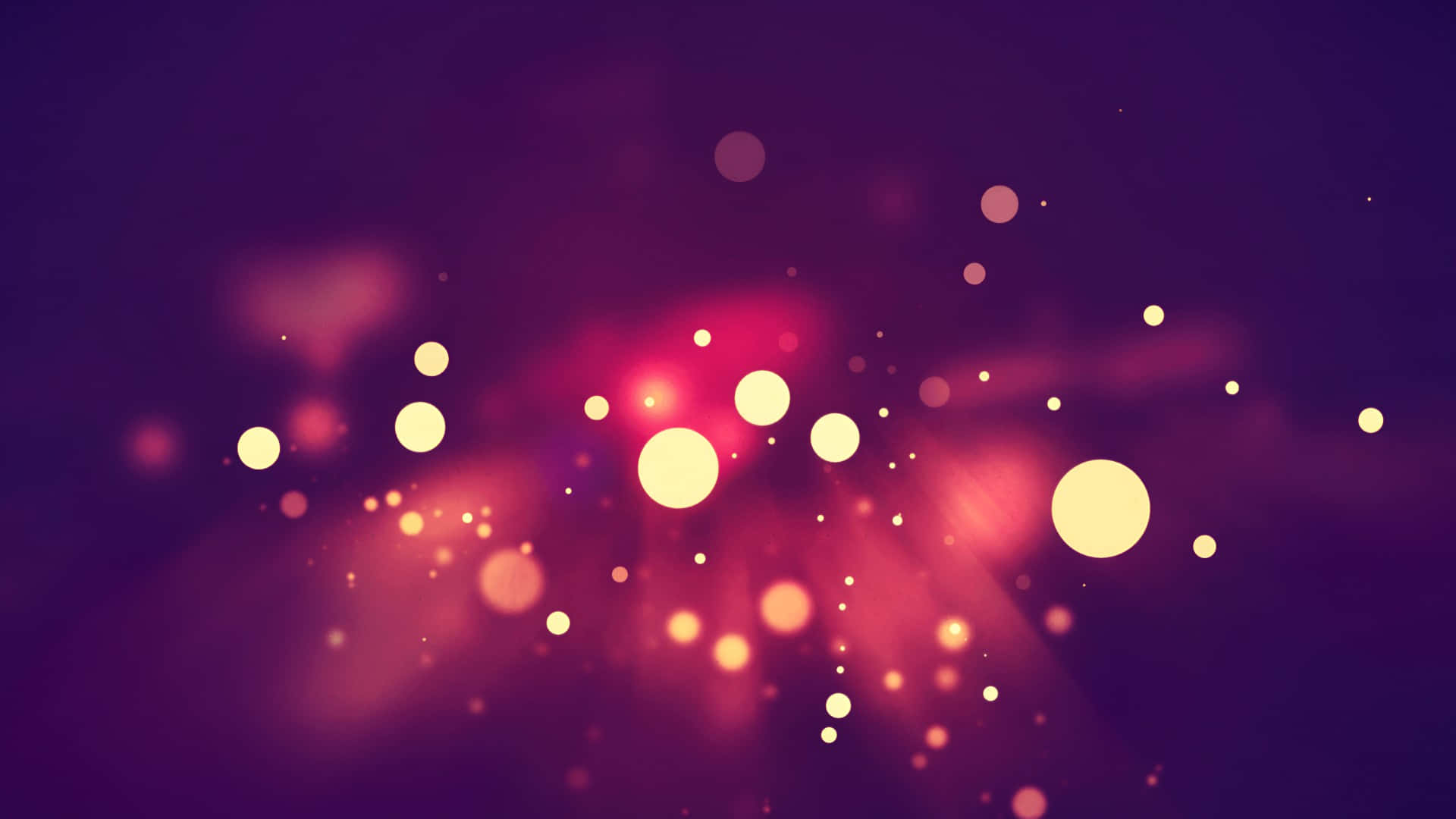  壁紙 — 鮮豔發光的球體漂浮在夢幻的紫色和粉紅色漸變背景中，帶有柔和散景效果。