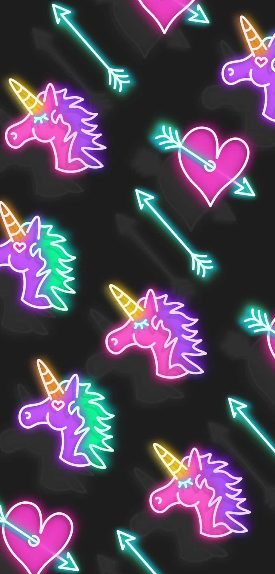  壁紙 — 充滿活力的霓虹獨角獸心形和箭頭在黑暗背景上以重複圖案發光。