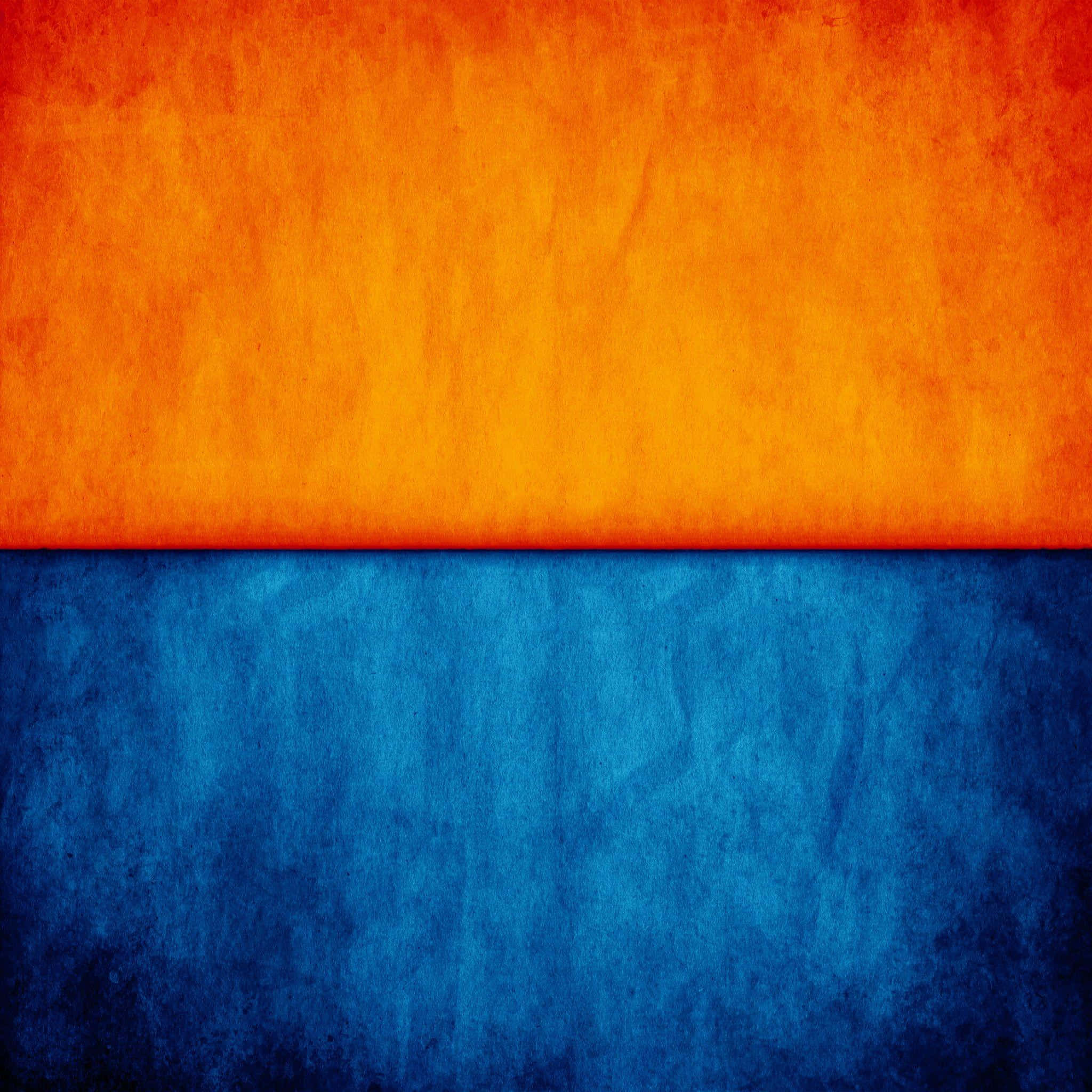 Orange And Blue 桌布 壁紙 — 充滿活力的橙色和深藍色紋理壁紙，水平分割，表面粗糙骯髒。