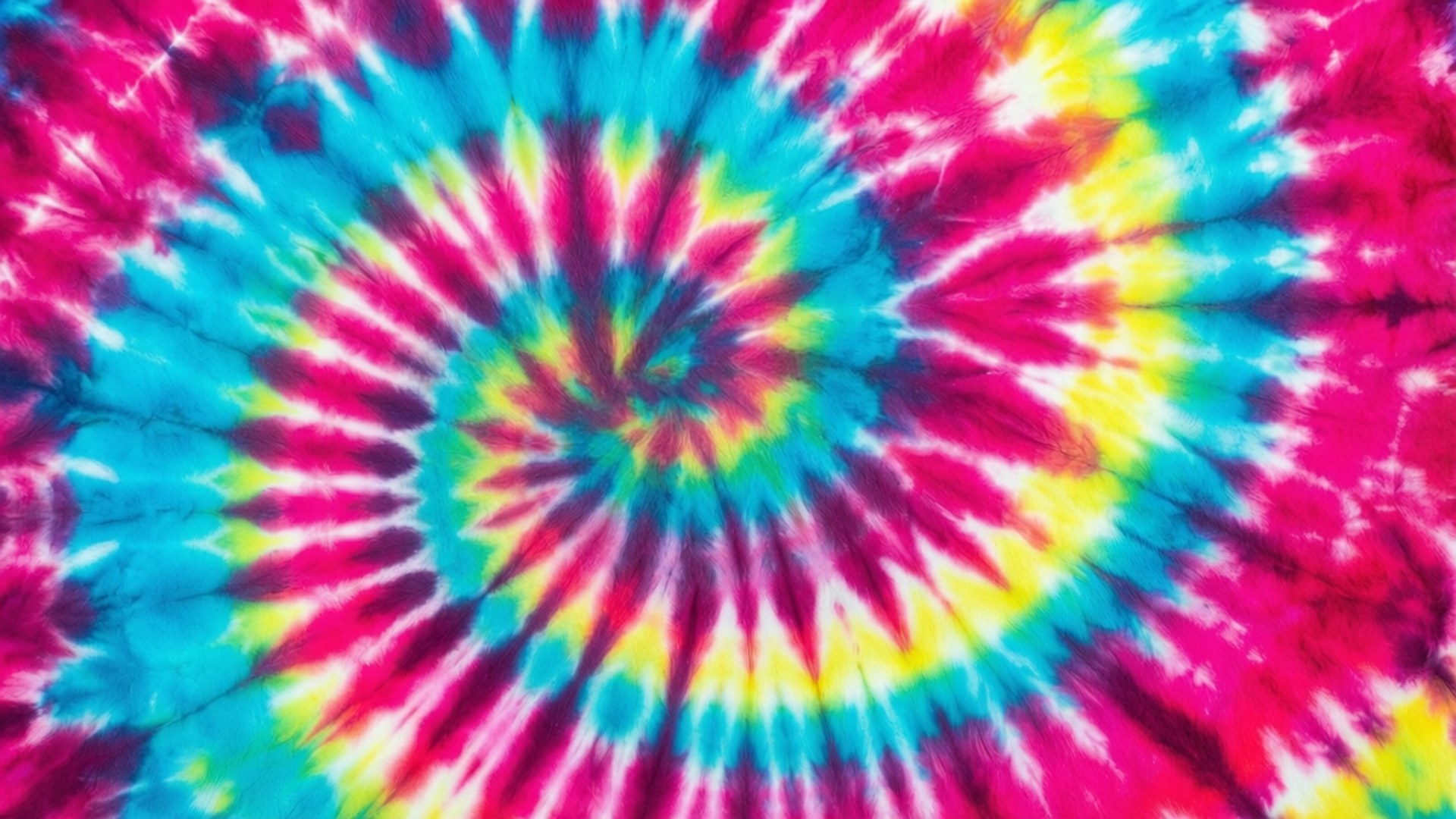 Neon Spiral Tie Dye 壁紙 — 充滿活力的迷幻紮染螺旋從中心輻射，帶有鮮明的洋紅色、青色、黃色和白色條紋。