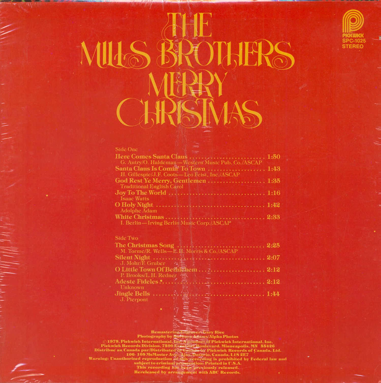 artist 桌布 壁紙 — The Mills Brothers Merry Christmas 的鮮紅色黑膠唱片背面封套，金色字體和曲目列表。