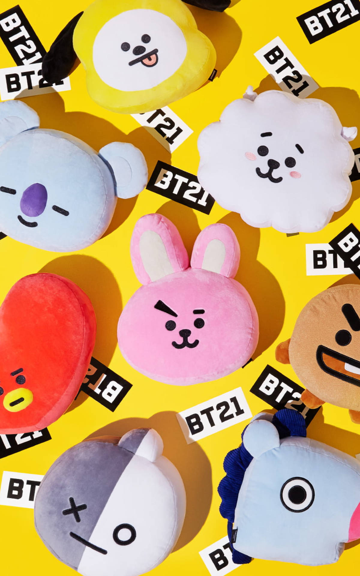 黃色背景上帶有品牌標籤的BT21毛絨玩具系列。 — Bts 壁紙