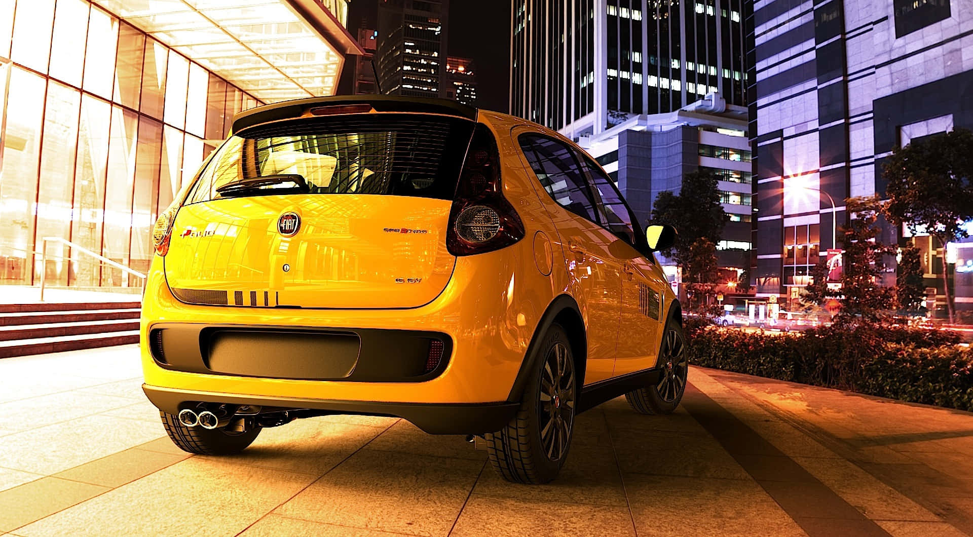 Fiat Palio 桌布 壁紙 — 一輛鮮黃色的Fiat Punto在夜間停放在城市人行道上，背景有發光的摩天大樓和路燈。